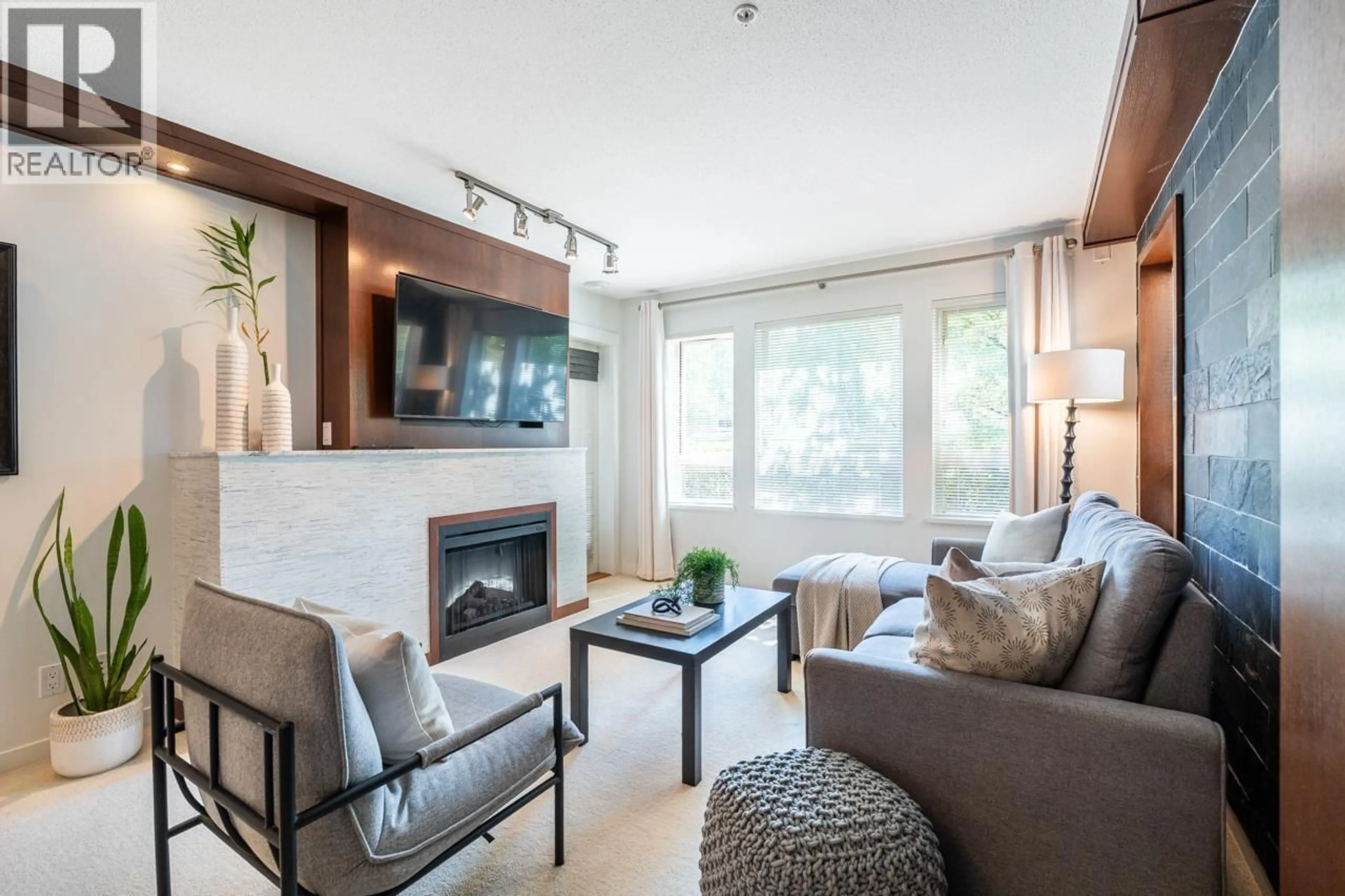Living room with furniture, wood/laminate floor for 102 - 3097 LINCOLN AVENUE, Coquitlam British Columbia V3B0E3