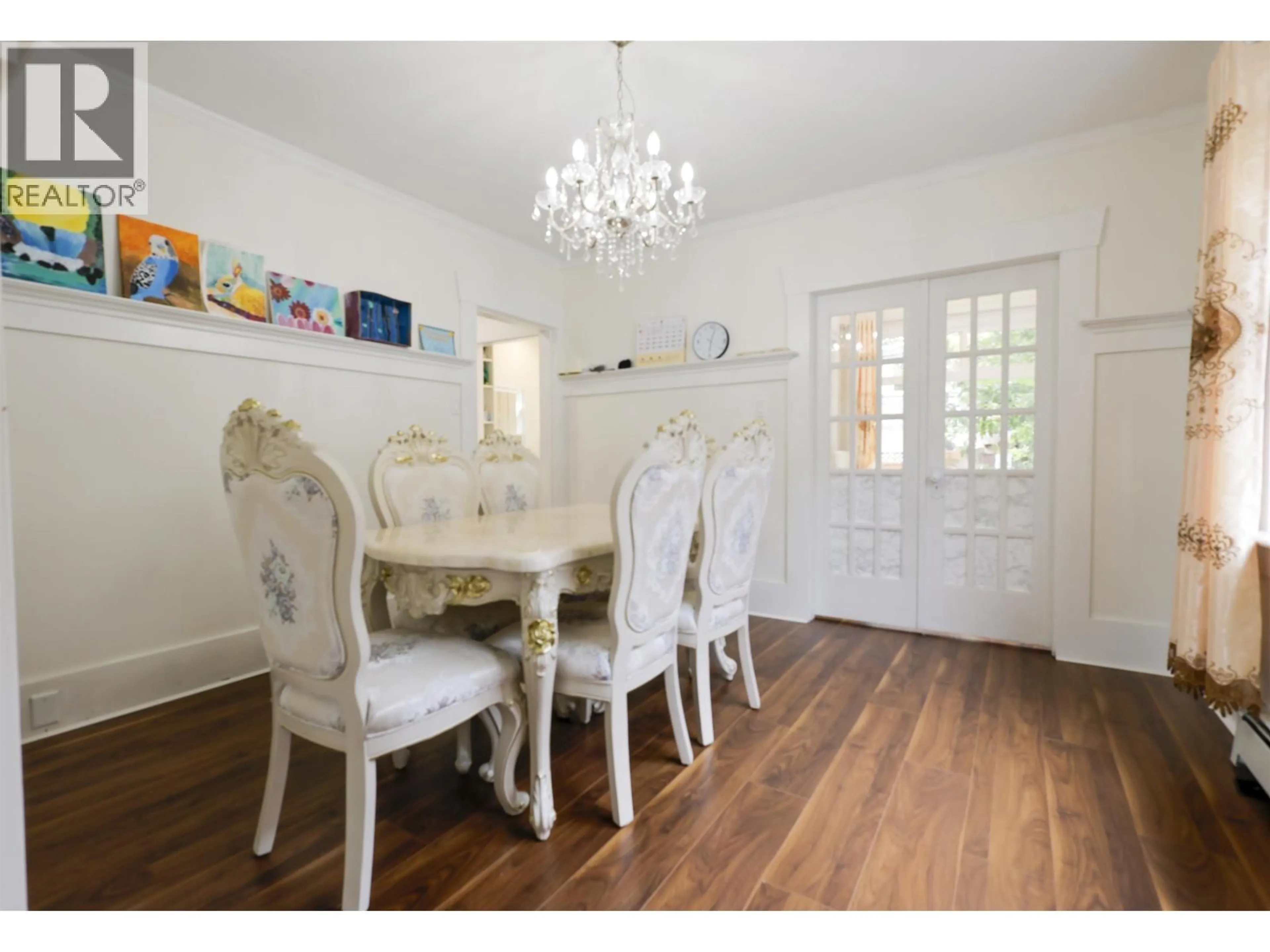 Dining room, wood/laminate floor for 3874 13TH AVENUE, Vancouver British Columbia V6R2S8