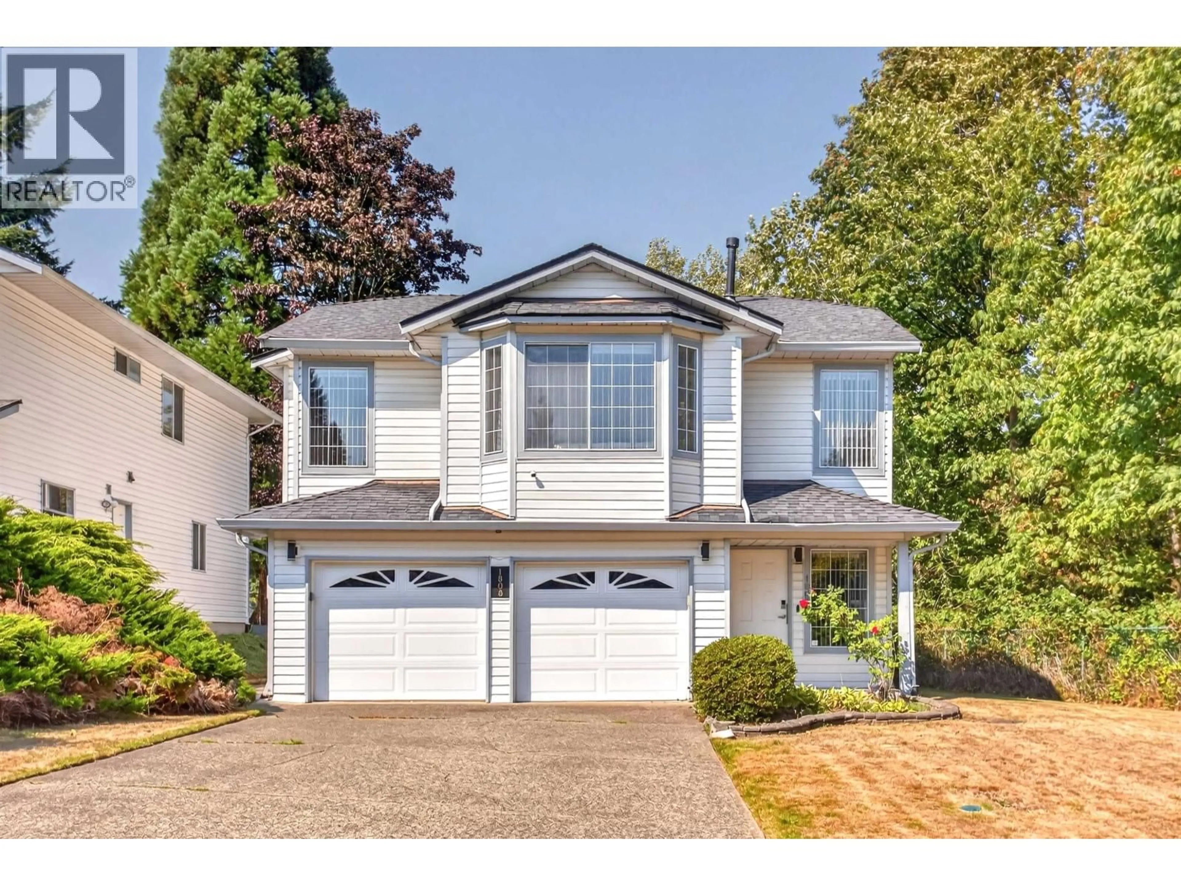 Home with vinyl exterior material, street for 1805 JACANA AVENUE, Port Coquitlam British Columbia V3C5C4