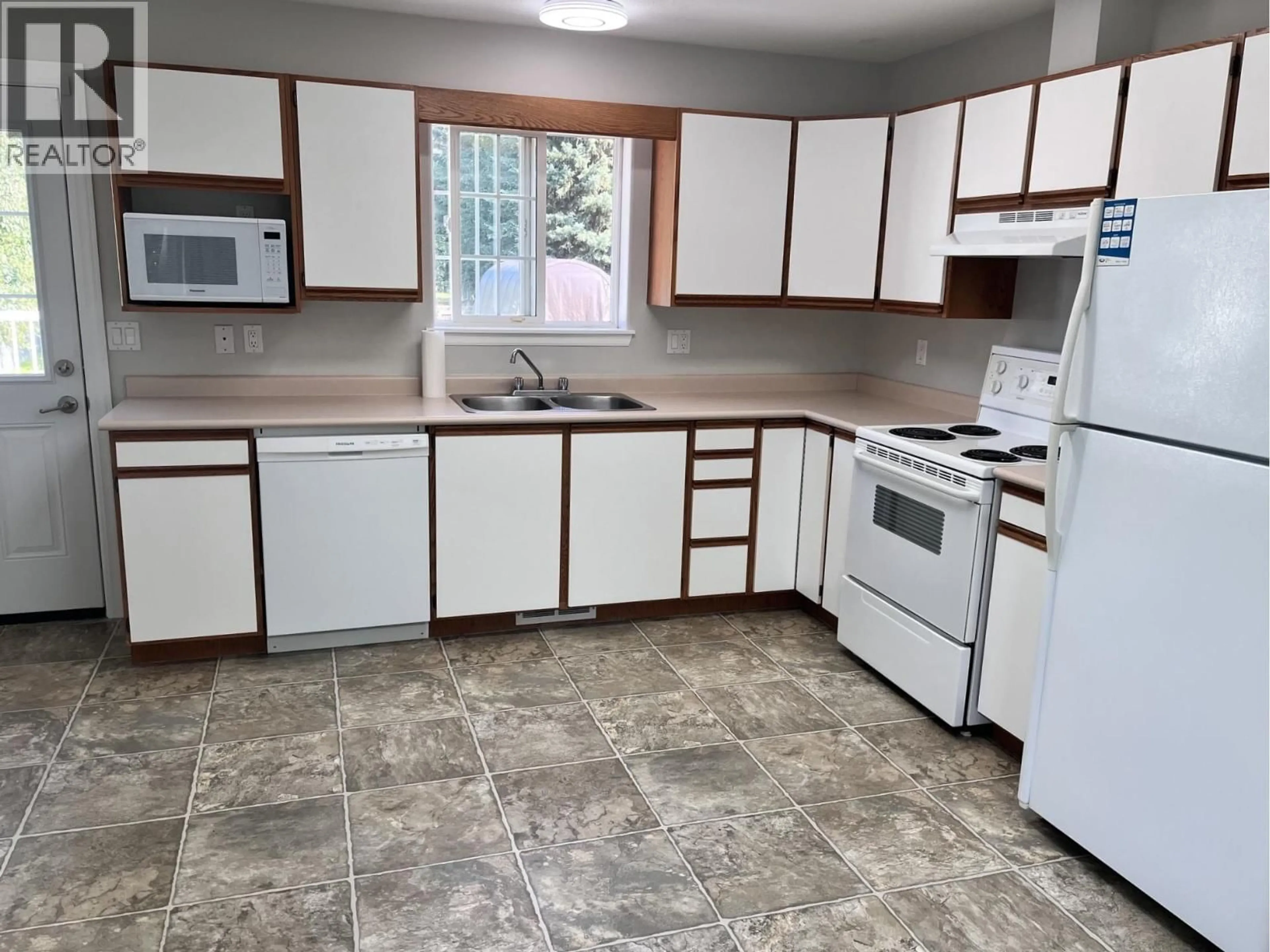 Standard kitchen, ceramic/tile floor for 2210 GASSOFF ROAD, Quesnel British Columbia V2J4E6