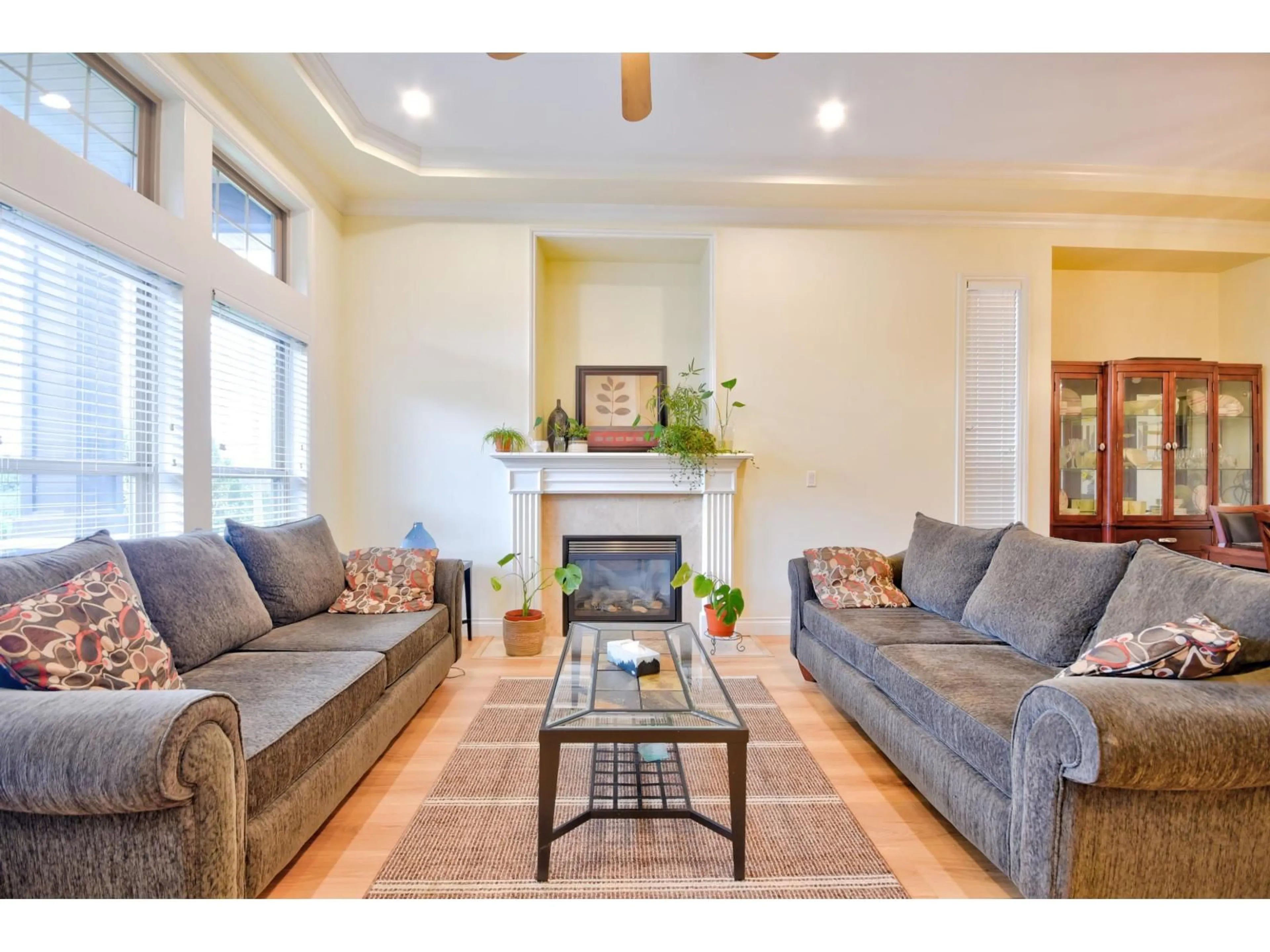 Living room with furniture, wood/laminate floor for 16328 88 AVENUE, Surrey British Columbia V4N1B6