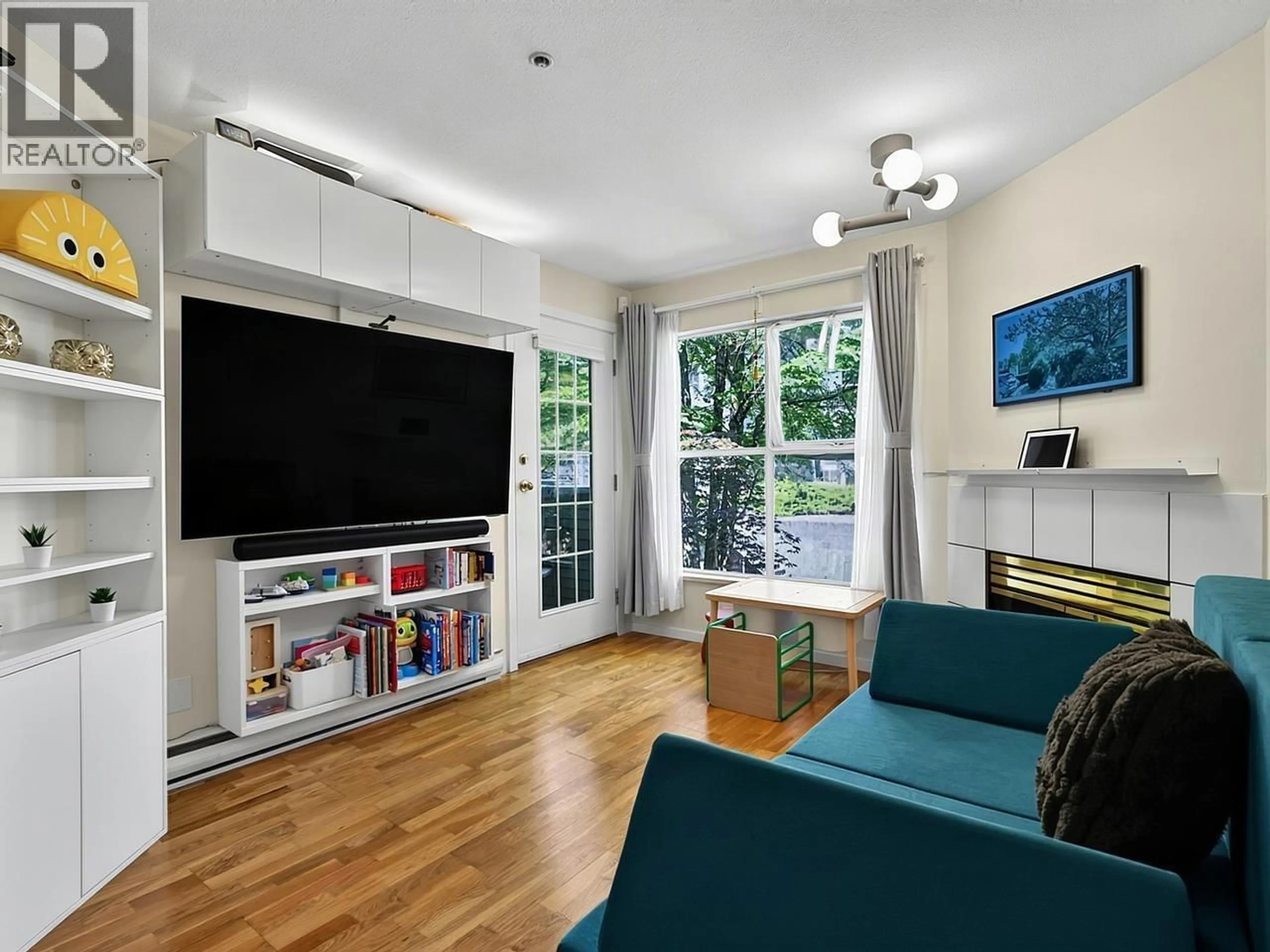 Living room with furniture, wood/laminate floor for 307 - 509 CARNARVON STREET, New Westminster British Columbia V3L5S4
