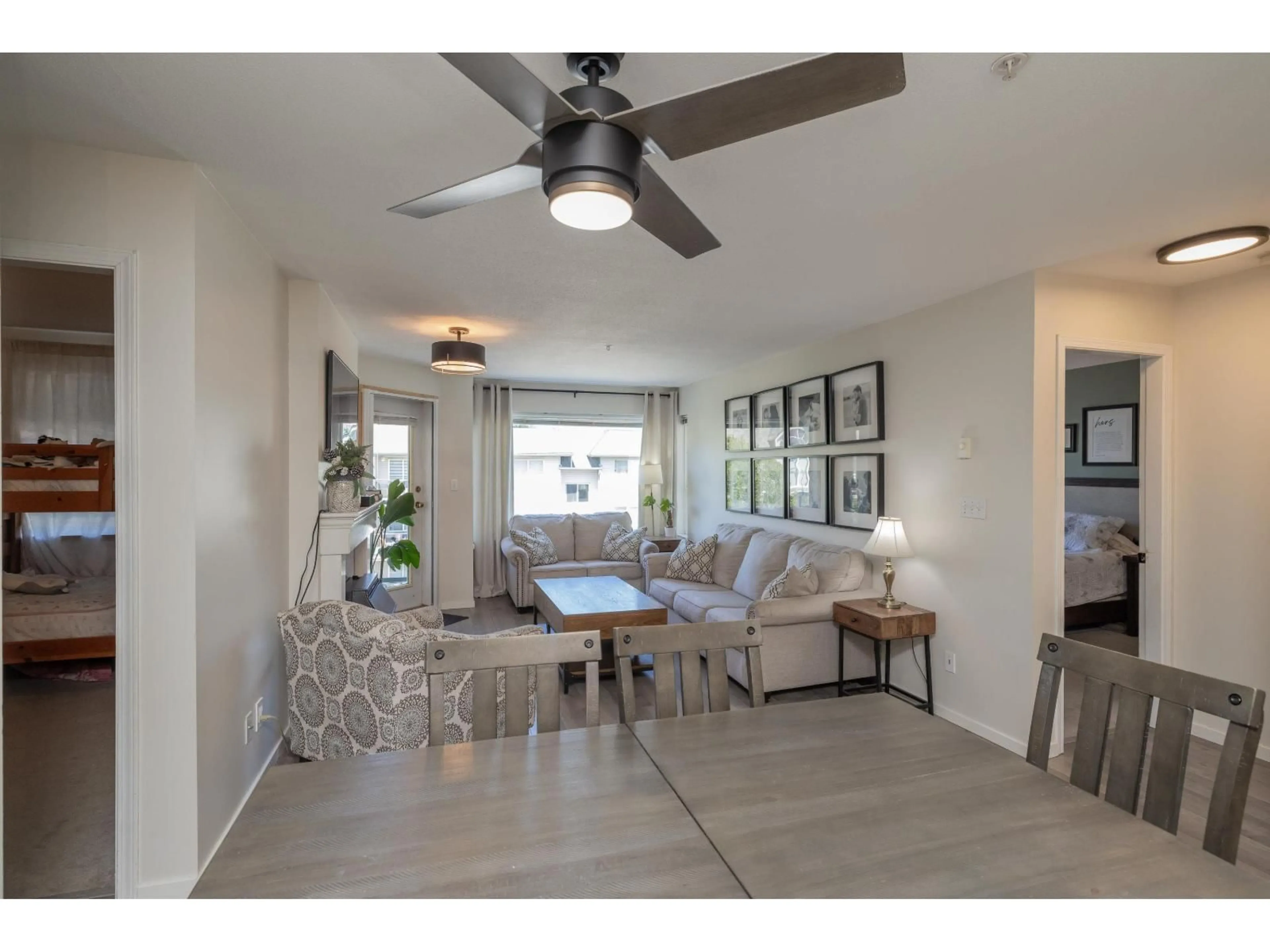 Living room with furniture, ceramic/tile floor for 402 - 33668 KING ROAD, Abbotsford British Columbia V2S7P8