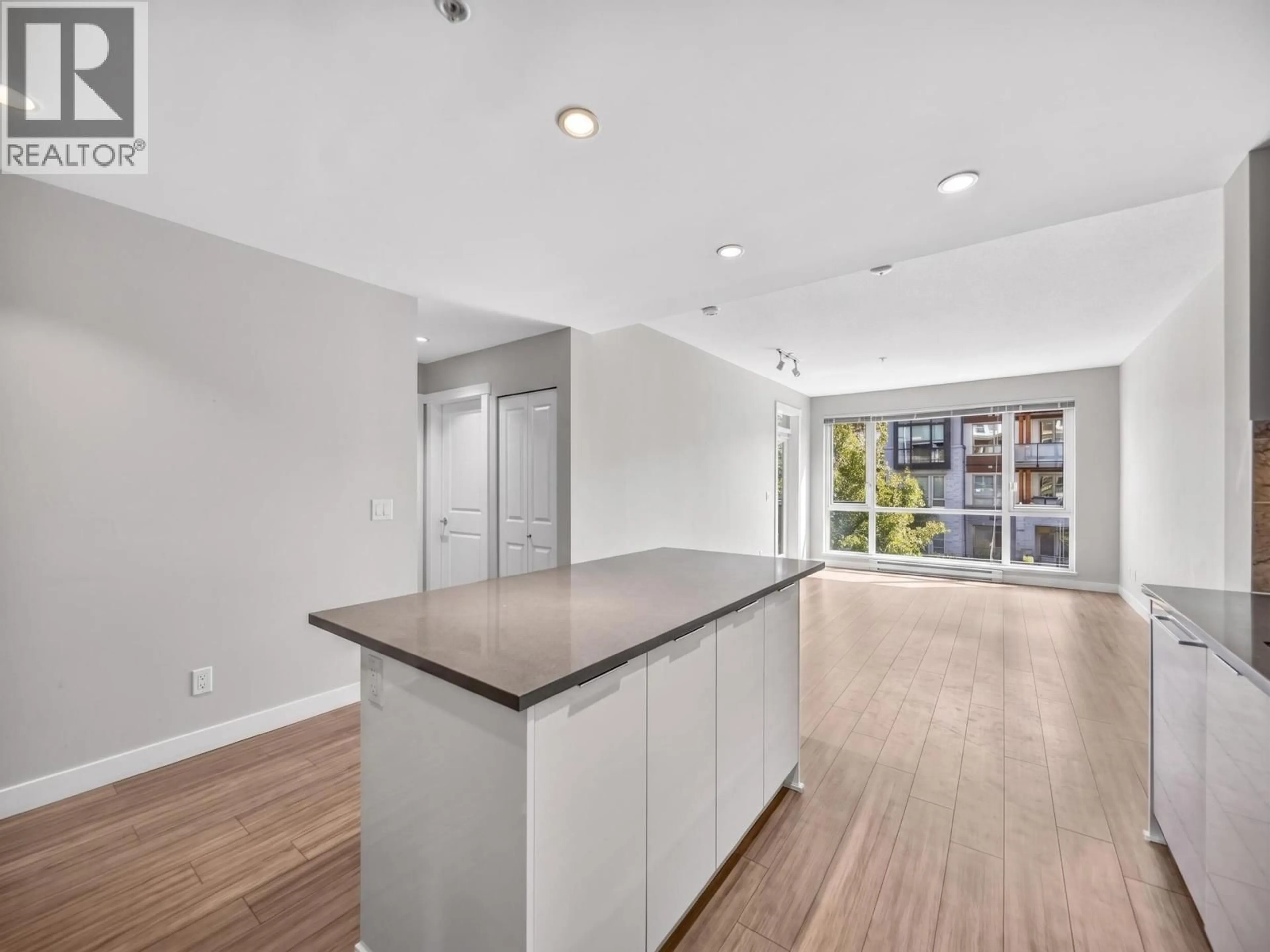 Open concept kitchen, unknown for 204 - 2651 LIBRARY LANE, North Vancouver British Columbia V7J0C1
