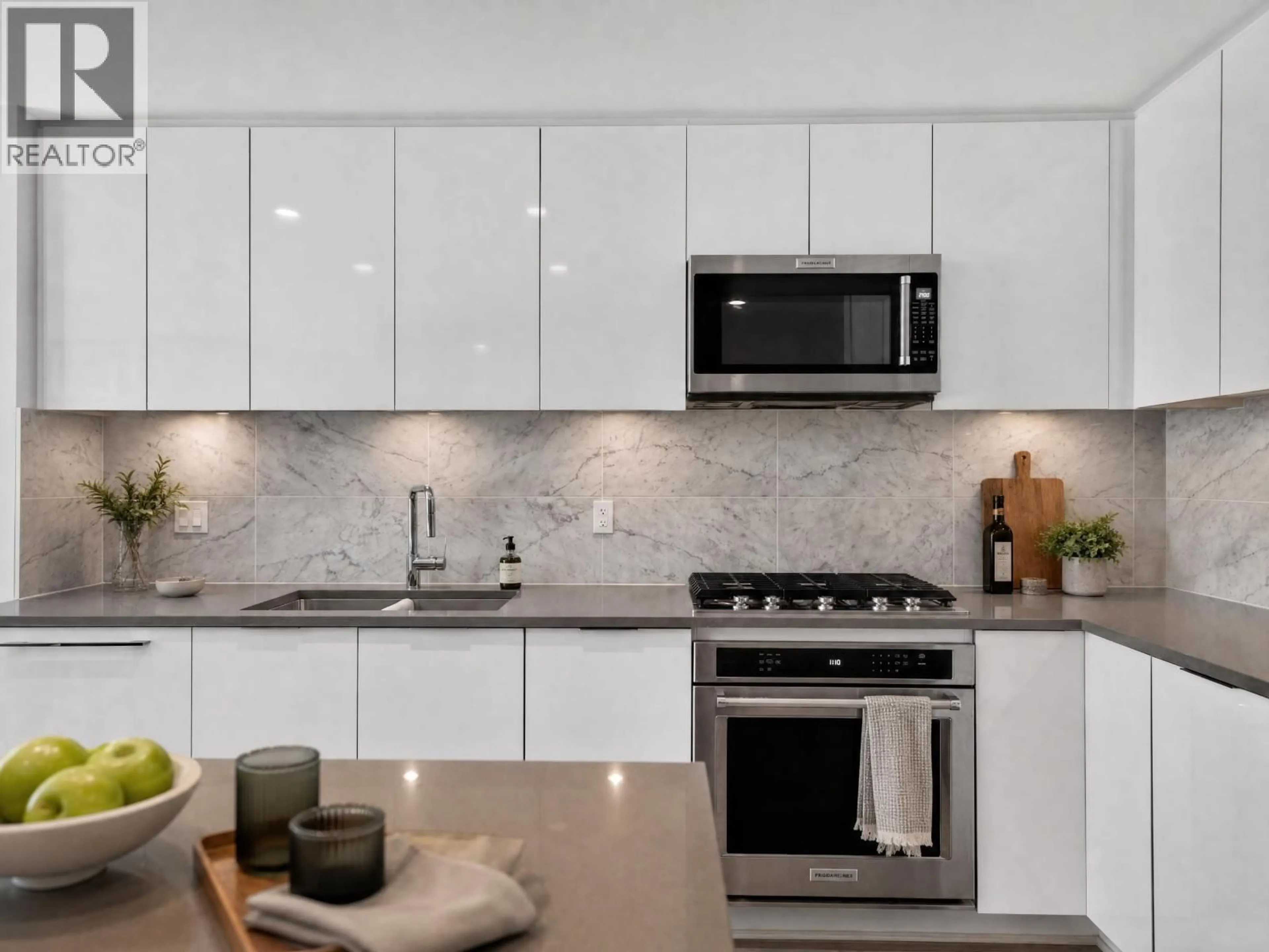 Open concept kitchen, ceramic/tile floor for 204 - 2651 LIBRARY LANE, North Vancouver British Columbia V7J0C1