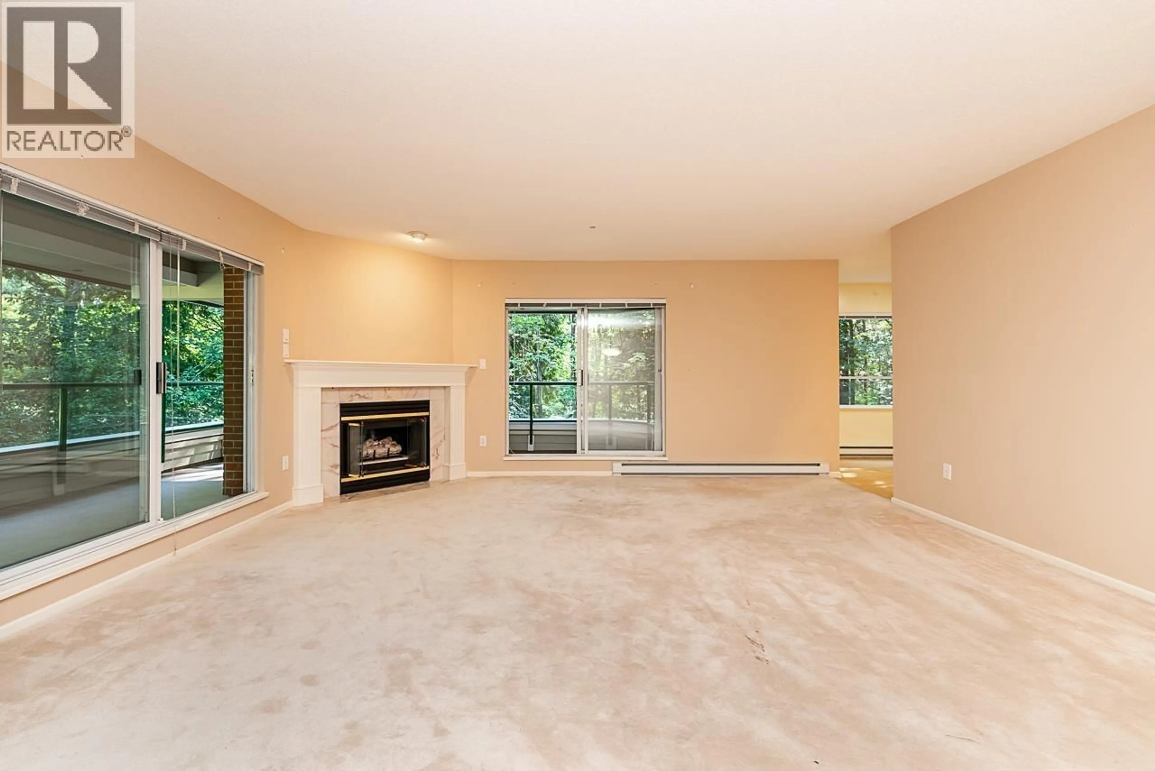Living room with furniture, unknown for 208 - 3690 BANFF COURT, North Vancouver British Columbia V7H2Y7