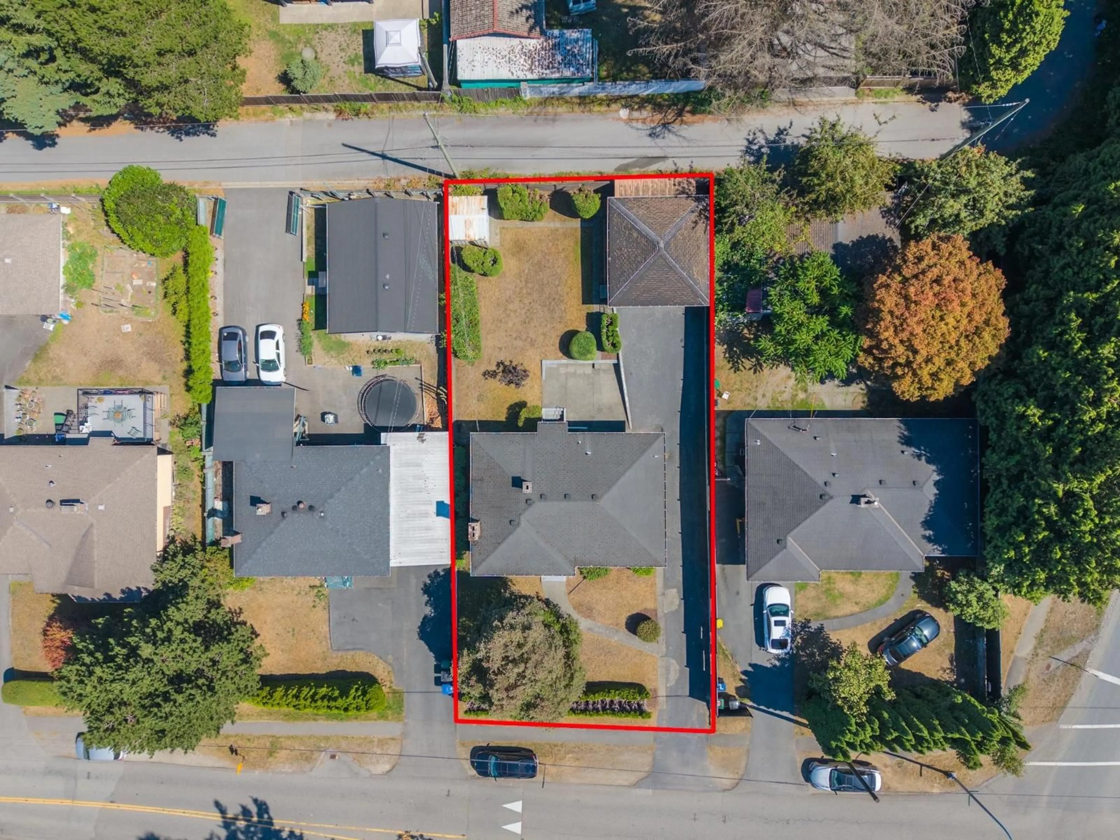 A pic from outside/outdoor area/front of a property/back of a property/a pic from drone, street for 10836 128 STREET, Surrey British Columbia V3T3A3