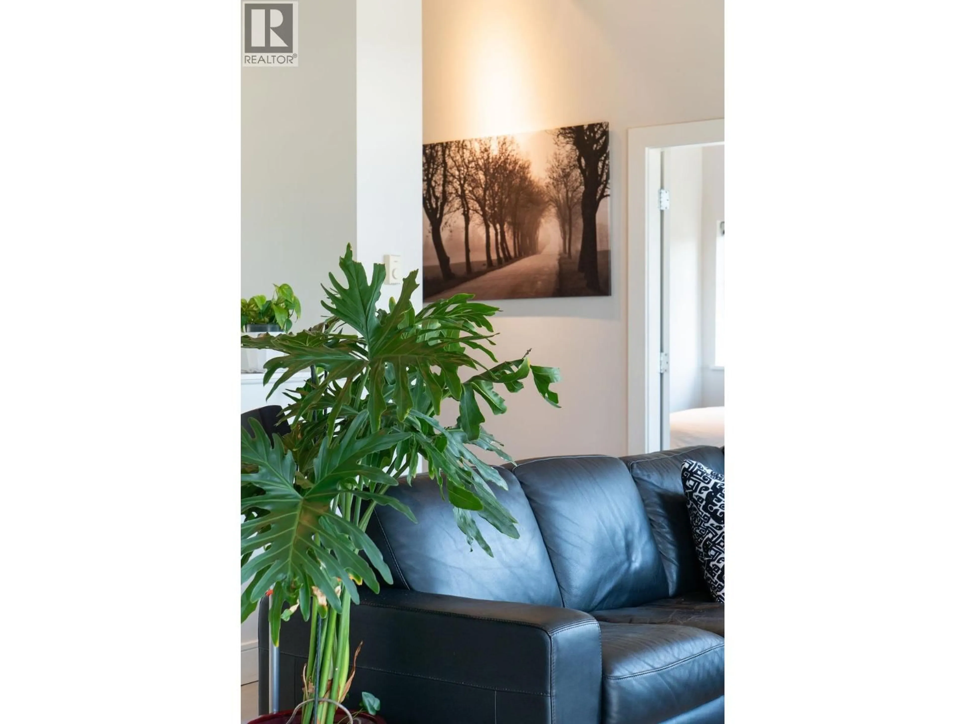 Living room with furniture, wood/laminate floor for 301 - 1075 1ST STREET, North Vancouver British Columbia V7P3T4