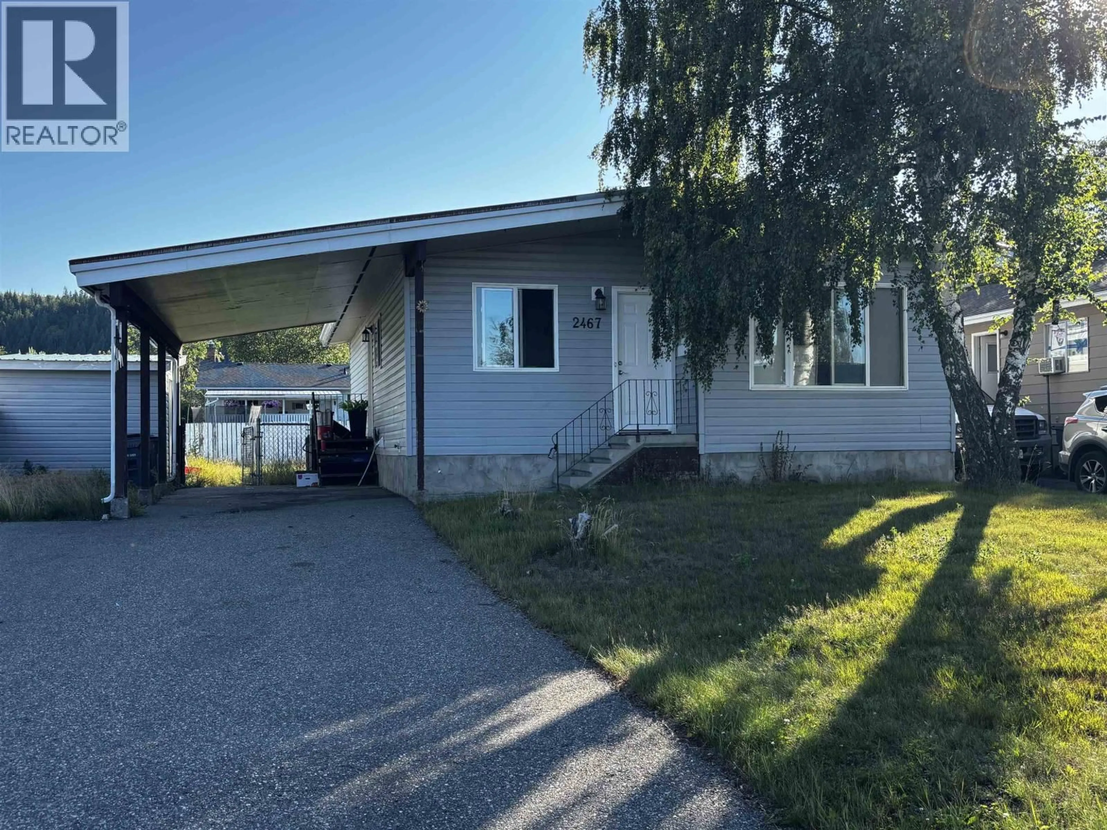 Home with vinyl exterior material, street for 2467 FOOT STREET, Prince George British Columbia V2N2Y5