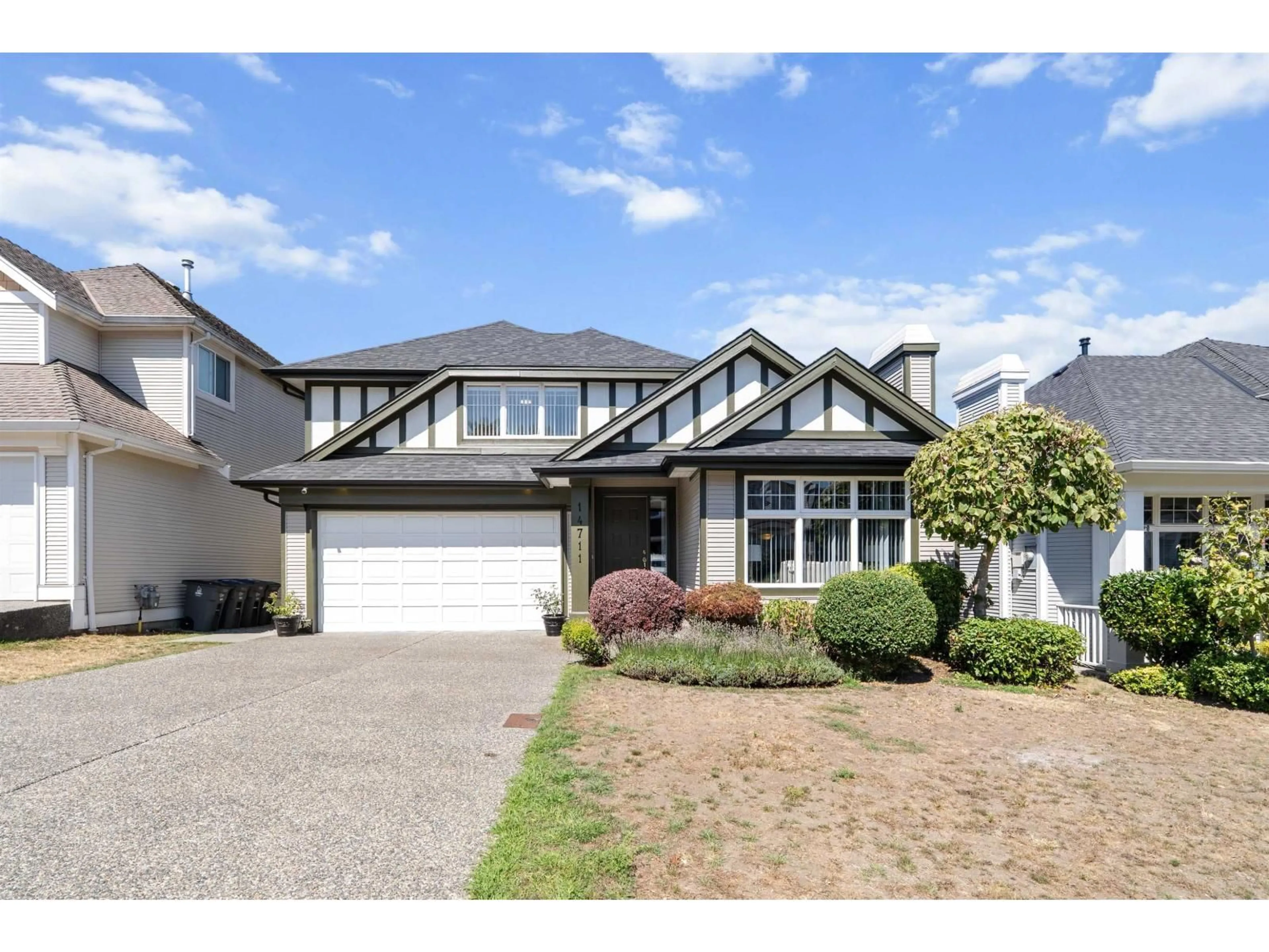 Home with vinyl exterior material, street for 14711 75A AVENUE, Surrey British Columbia V3S8Y6