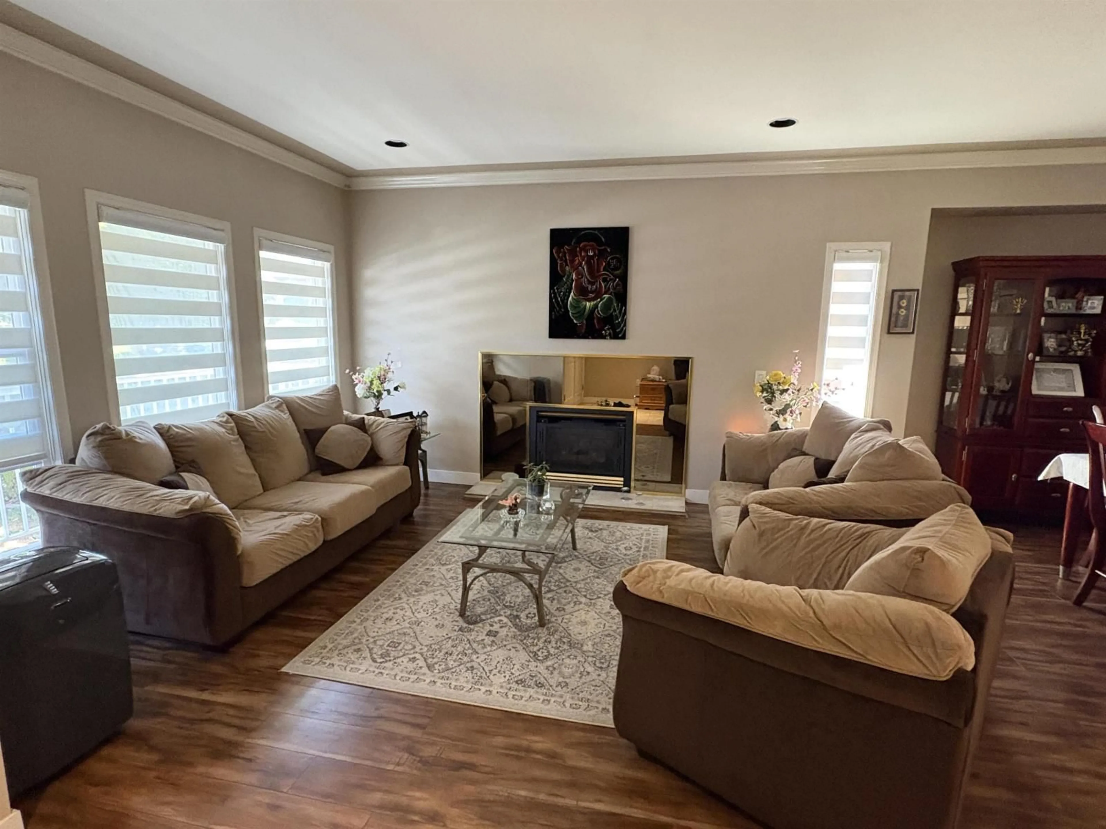 Living room with furniture, wood/laminate floor for 7719 147A STREET, Surrey British Columbia V3S8Z4