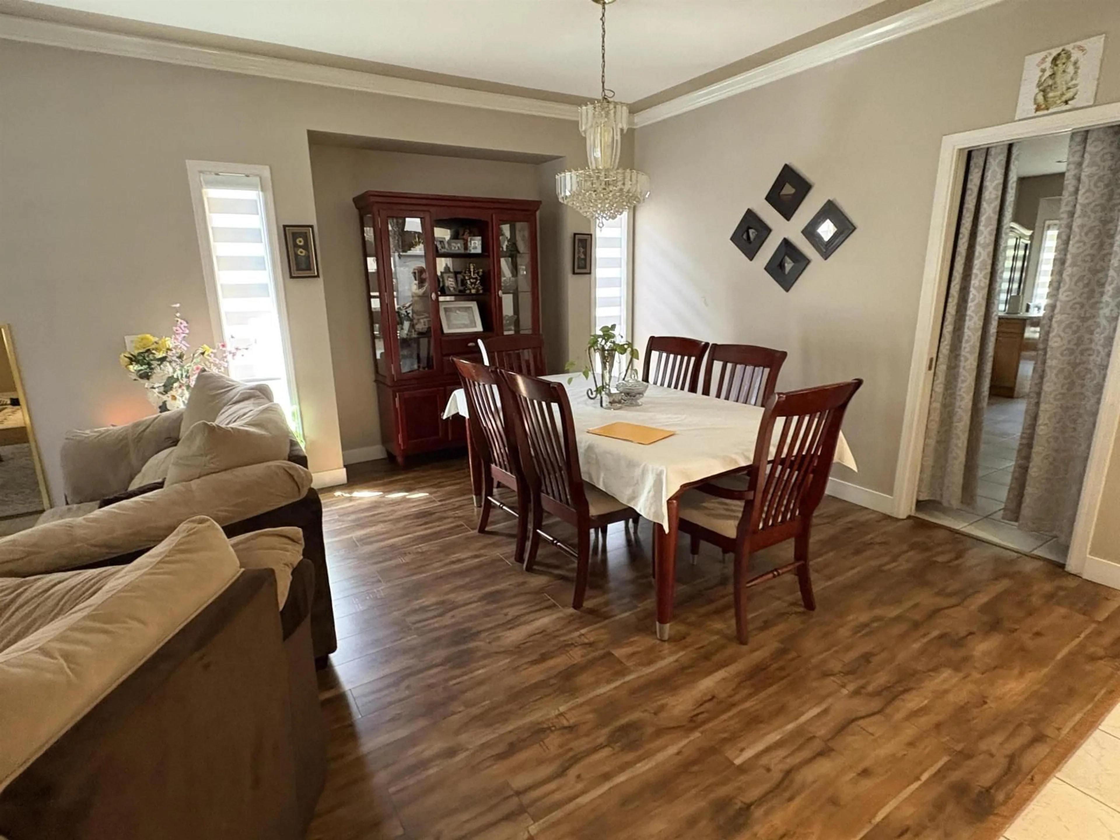 Dining room, wood/laminate floor for 7719 147A STREET, Surrey British Columbia V3S8Z4