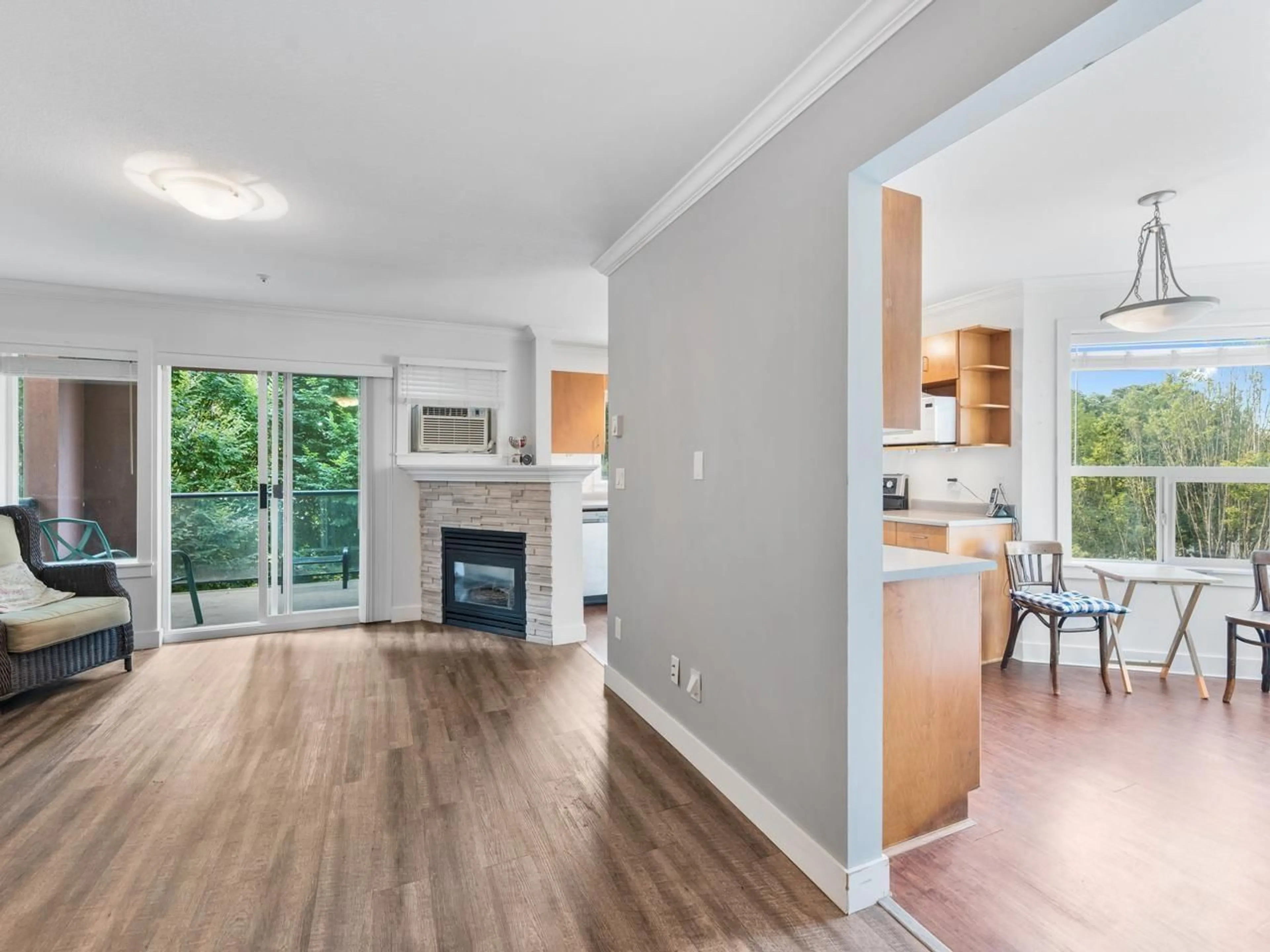 Open concept kitchen, wood/laminate floor for 303 - 20239 MICHAUD CRESCENT, Langley British Columbia V3A8L1