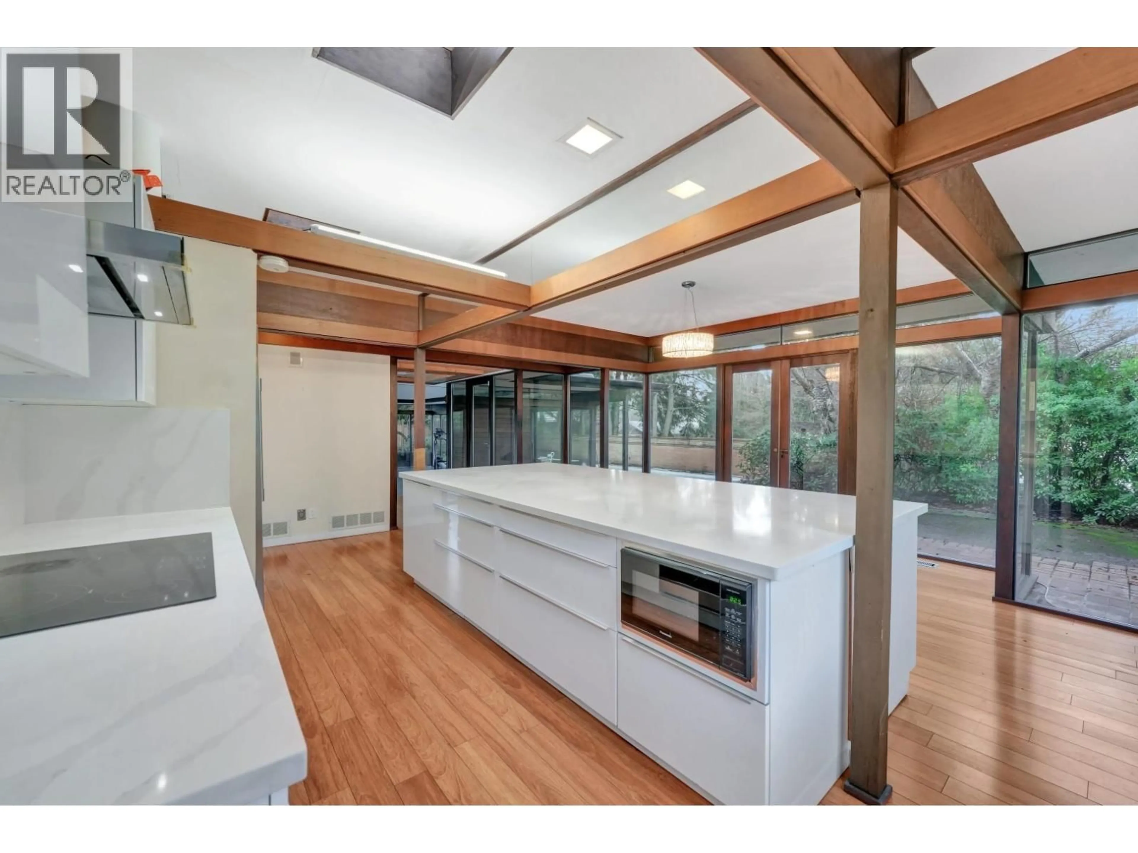 Open concept kitchen, wood/laminate floor for 4290 SALISH DRIVE, Vancouver British Columbia V6N3M6