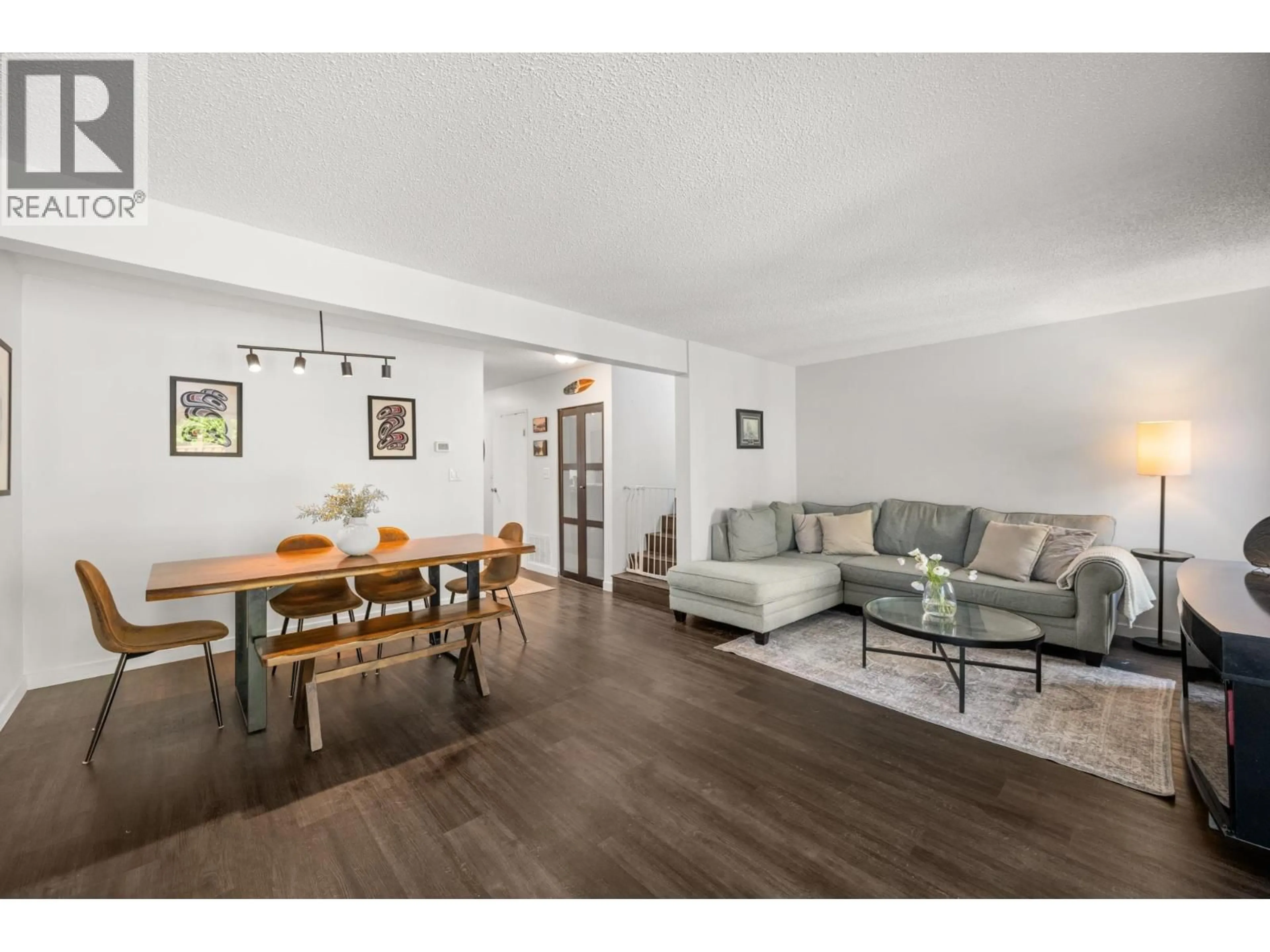 Living room with furniture, wood/laminate floor for 5019 57 STREET, Ladner British Columbia V4K3E7