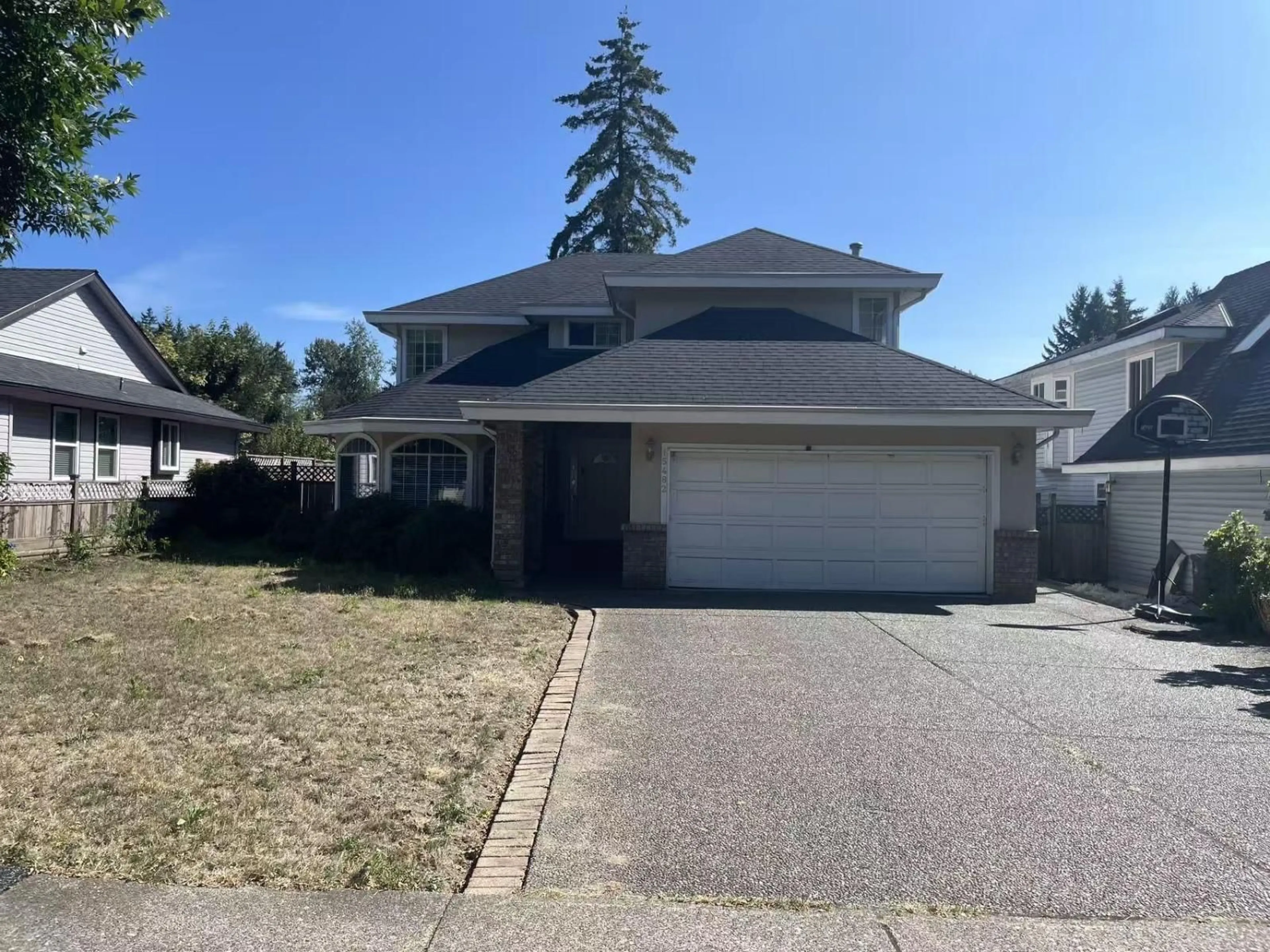 Home with vinyl exterior material, street for 15482 112 AVENUE, Surrey British Columbia V3R6H1