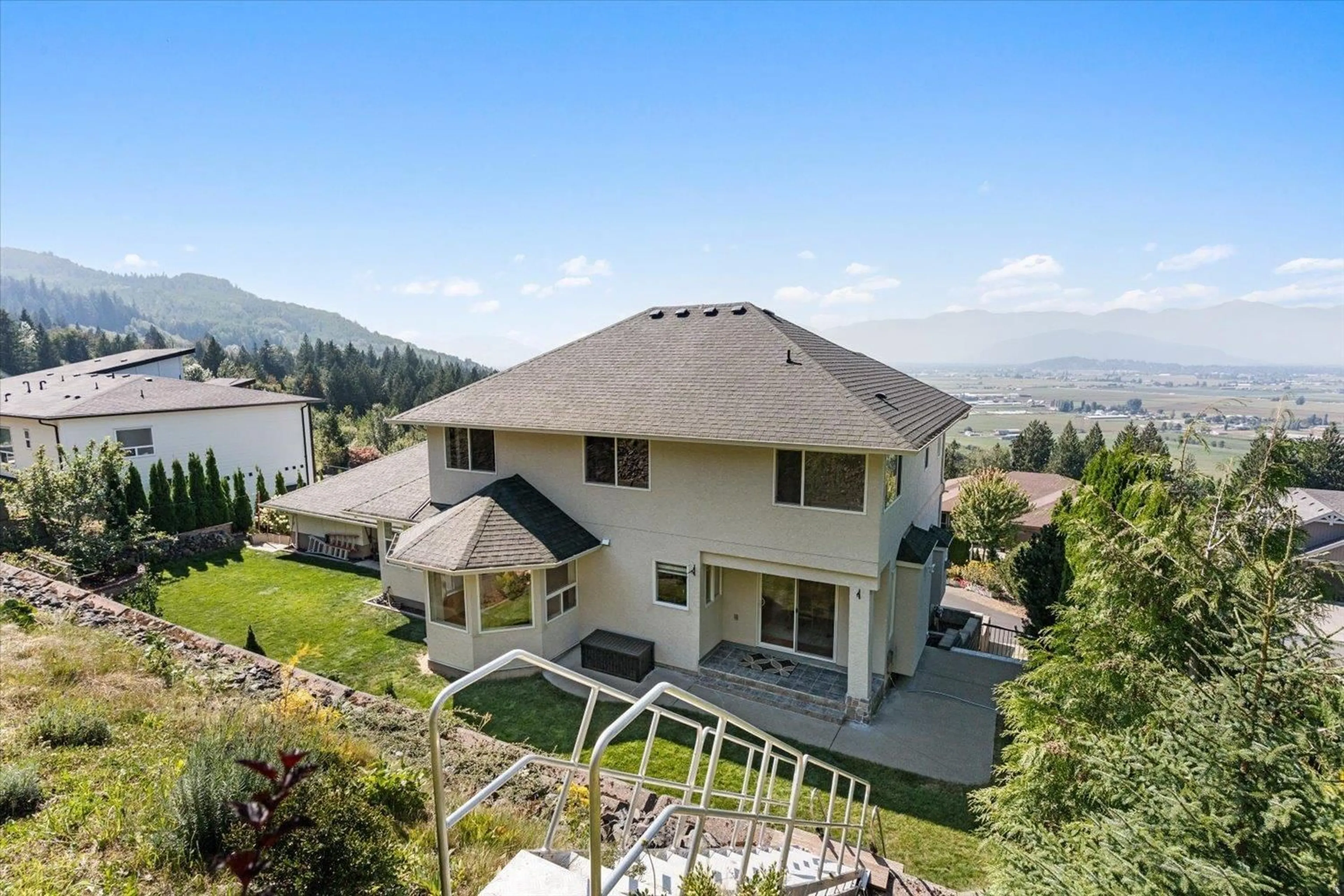 A pic from outside/outdoor area/front of a property/back of a property/a pic from drone, mountain view for 7304 MOUNT THURSTON DRIVE, Chilliwack British Columbia V4Z0A3