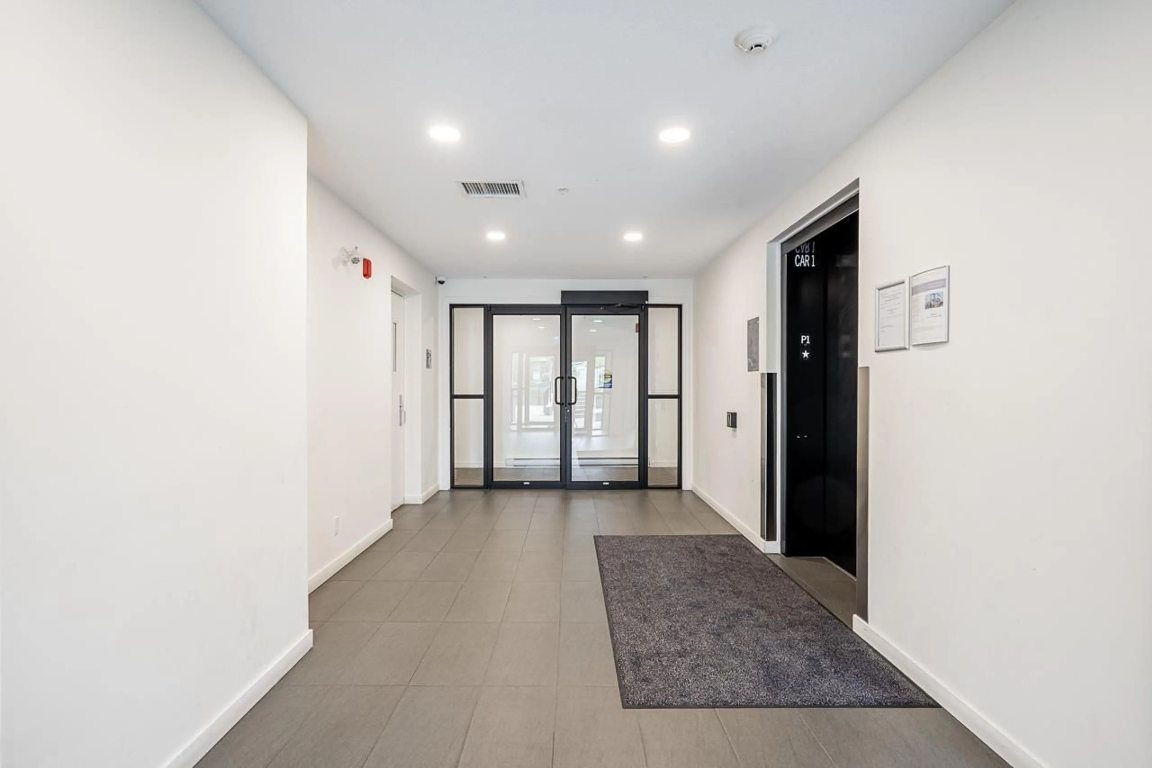Indoor foyer for B004 - 20087 68 AVENUE, Langley British Columbia V2Y0Y3