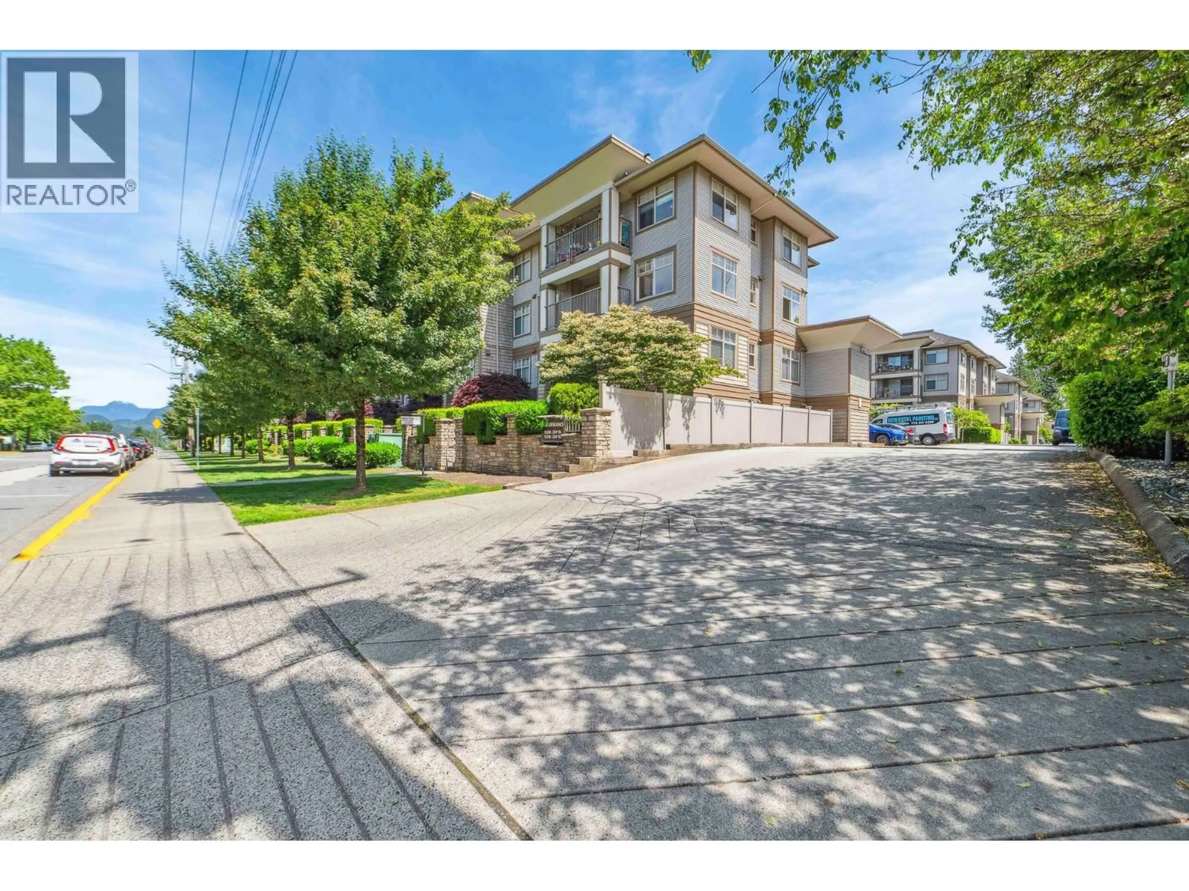 A pic from outside/outdoor area/front of a property/back of a property/a pic from drone, street for 111 - 12238 224 STREET, Maple Ridge British Columbia V2X8W5