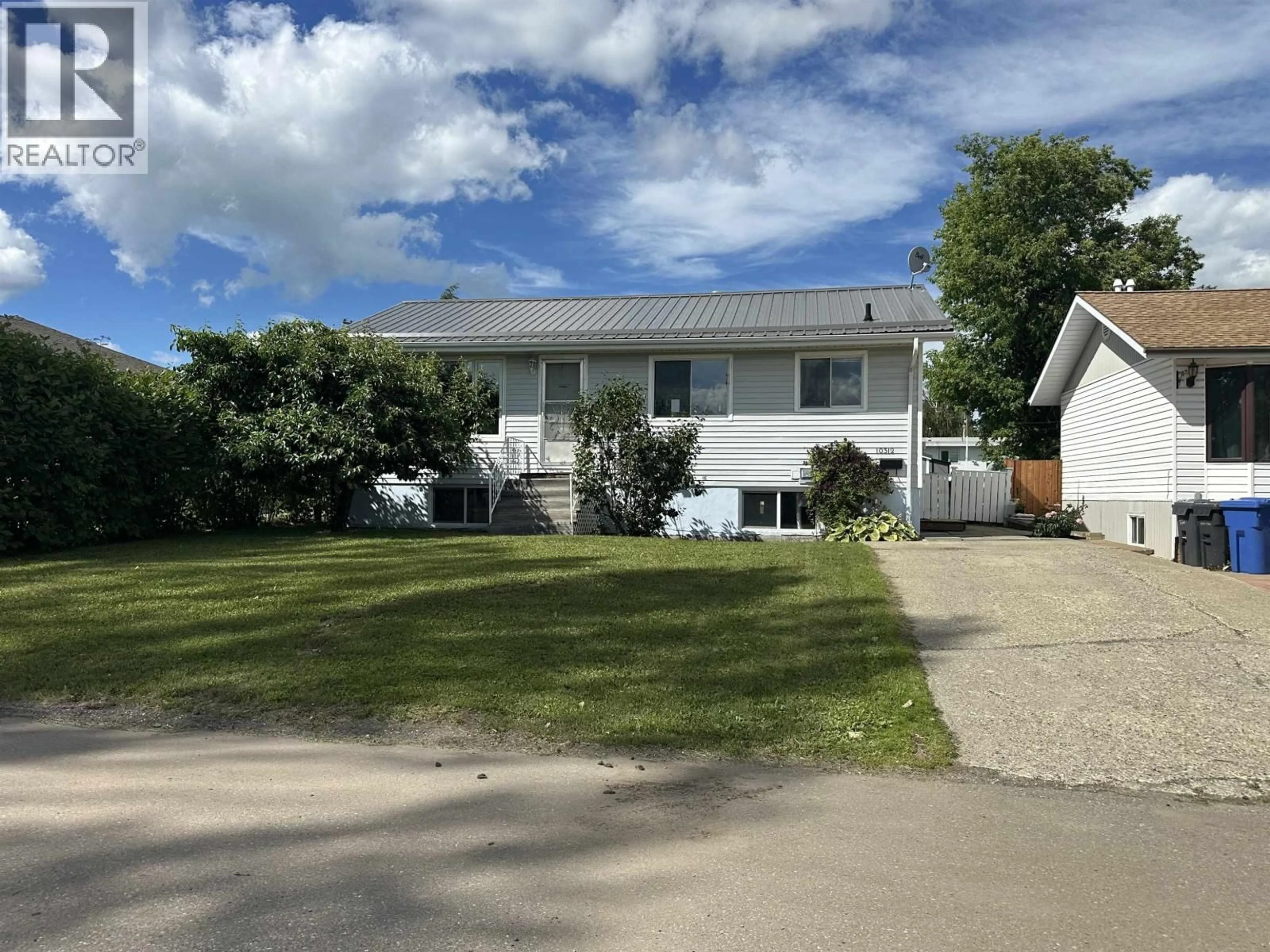 A pic from outside/outdoor area/front of a property/back of a property/a pic from drone, street for 10312 104 AVENUE, Fort St. John British Columbia V1J2K7