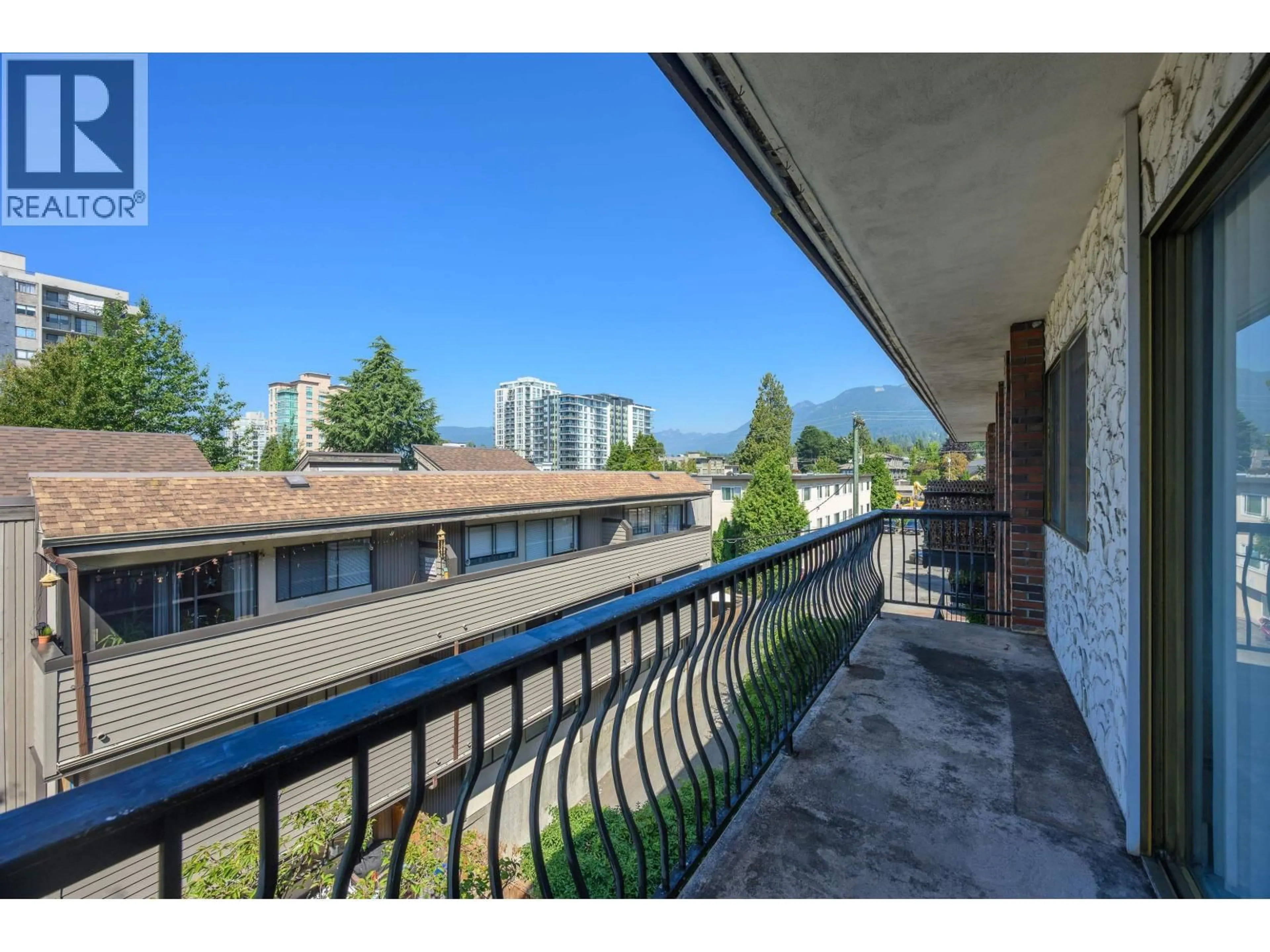 Balcony in the apartment, city buildings view from balcony for 302 - 214 15TH STREET, North Vancouver British Columbia V7L2R3