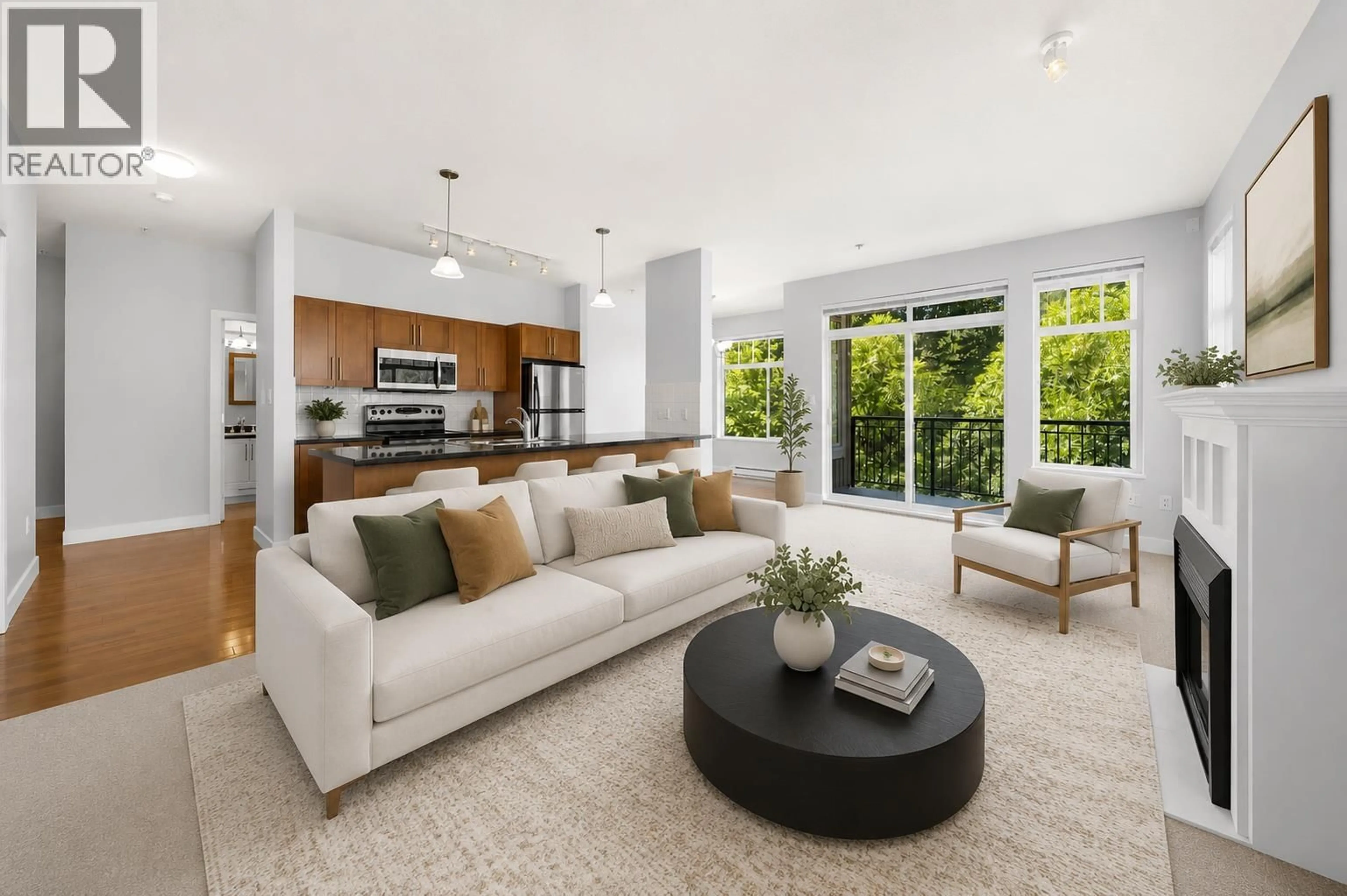Living room with furniture, unknown for 313 - 2353 MARPOLE AVENUE, Port Coquitlam British Columbia V3C2A1