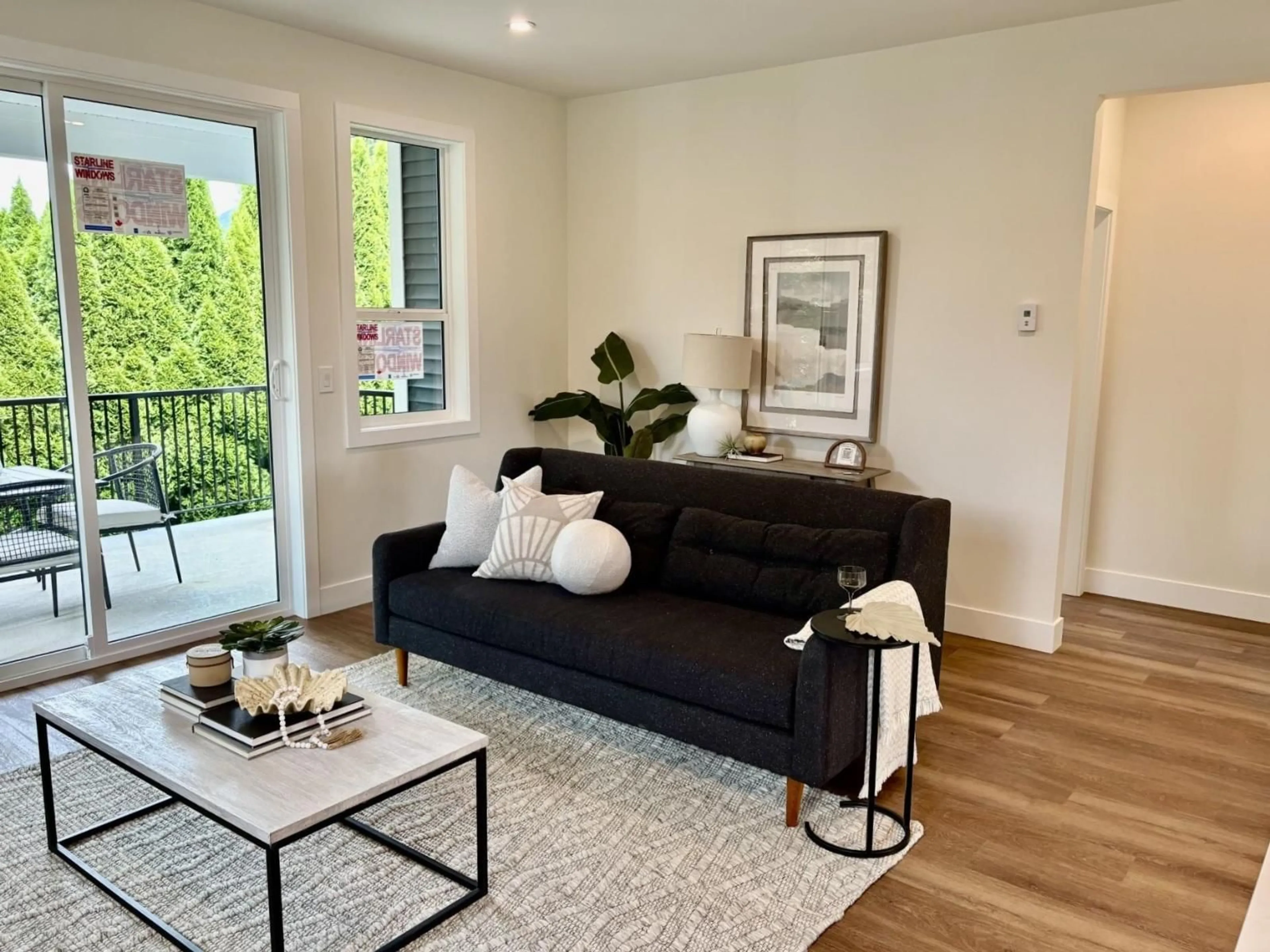 Living room with furniture, wood/laminate floor for 10167 HYMAR DRIVE, Chilliwack British Columbia V2P5T5