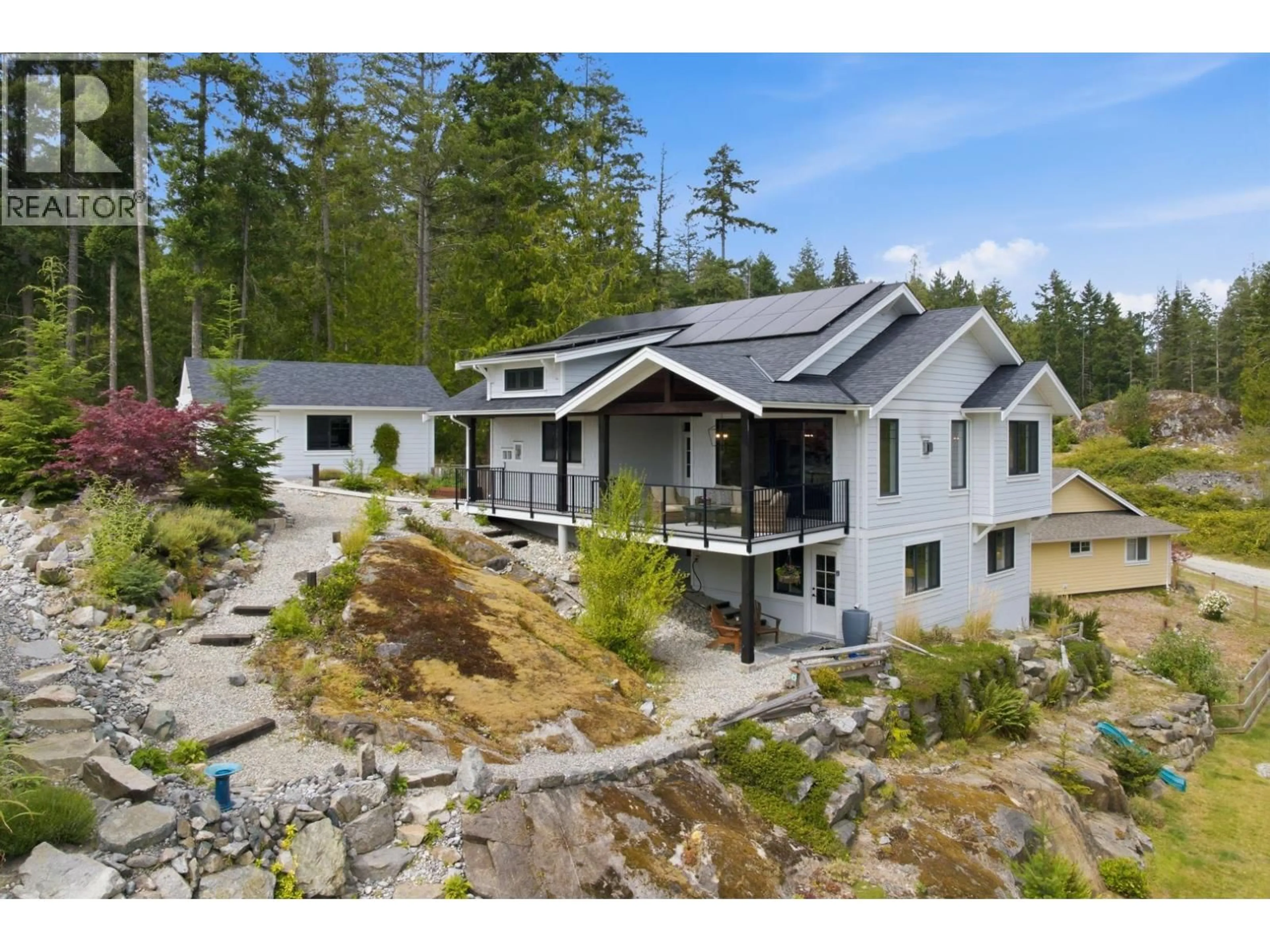 A pic from outside/outdoor area/front of a property/back of a property/a pic from drone, mountain view for 9336 JORGENSEN PLACE, Halfmoon Bay British Columbia V7Z1B4