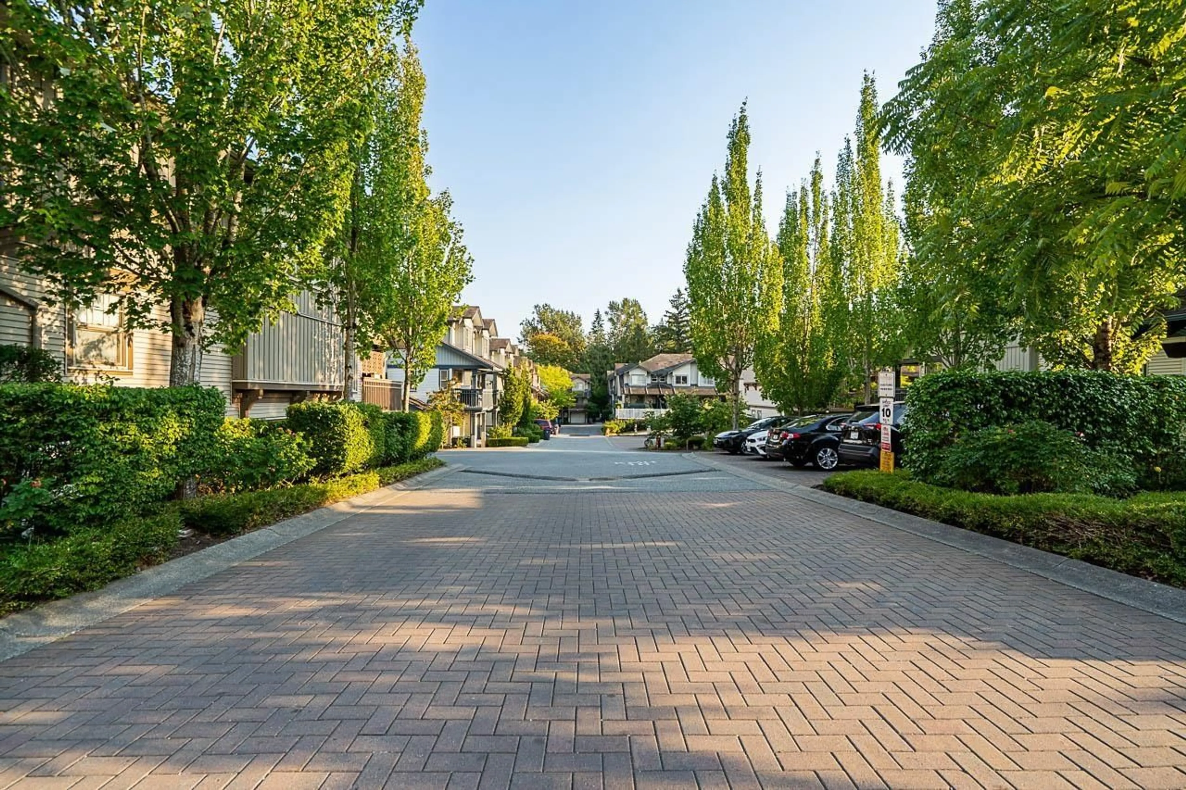 A pic from outside/outdoor area/front of a property/back of a property/a pic from drone, street for 1 - 19250 65 AVENUE, Surrey British Columbia V4N5R7