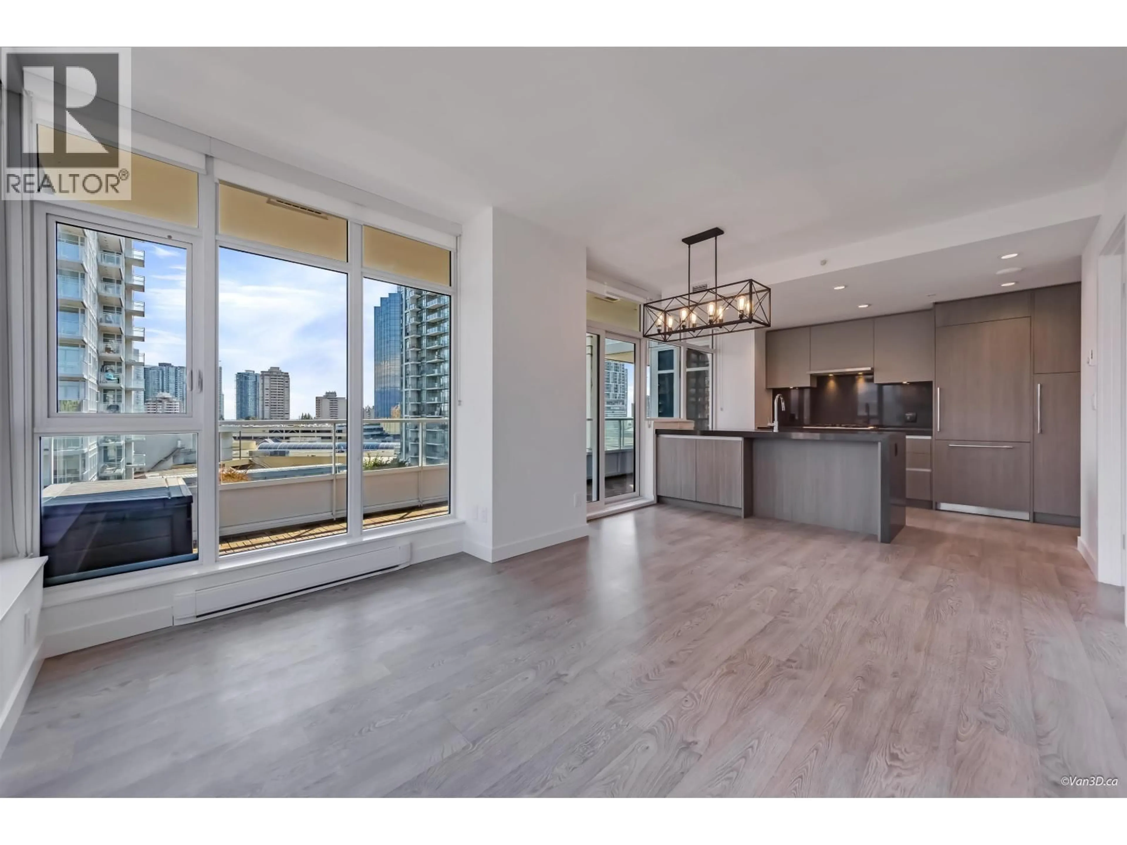 Open concept kitchen, wood/laminate floor for 907 - 6080 MCKAY AVENUE, Burnaby British Columbia V5H0J4