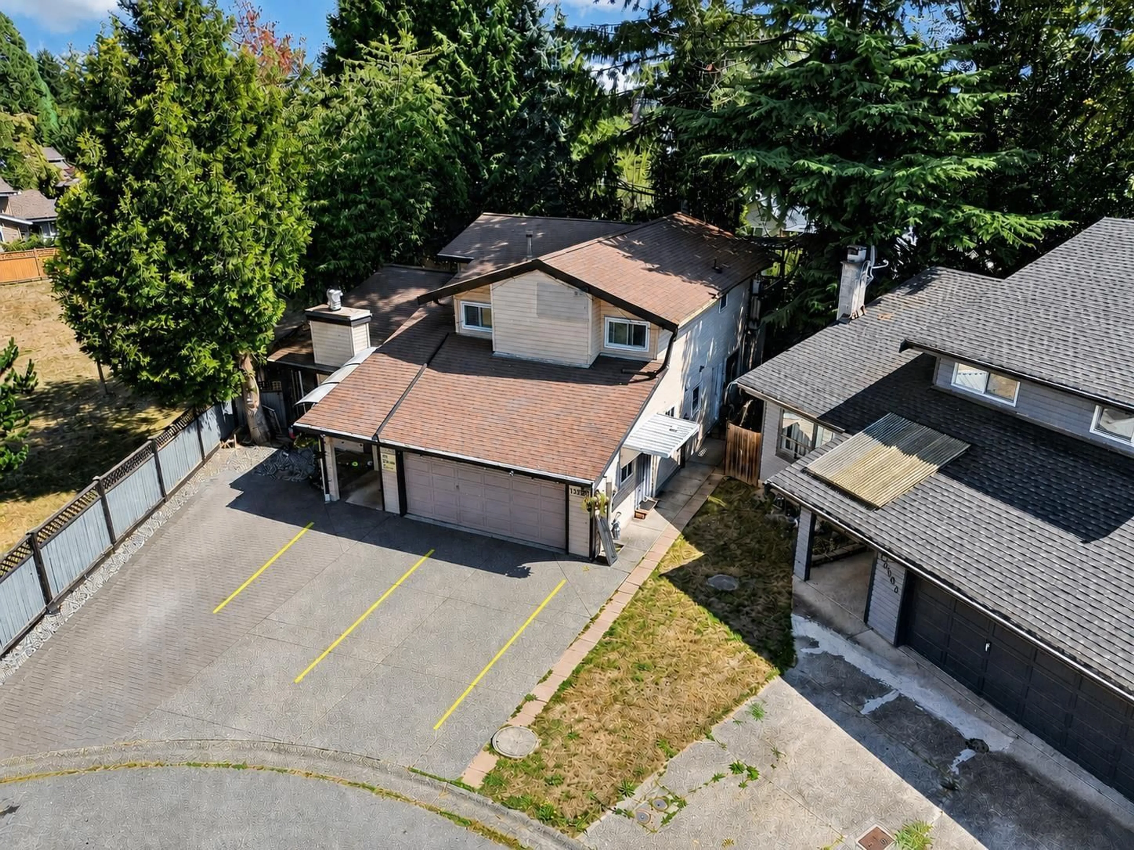 A pic from outside/outdoor area/front of a property/back of a property/a pic from drone, street for 13355 65A AVENUE, Surrey British Columbia V3W8T2