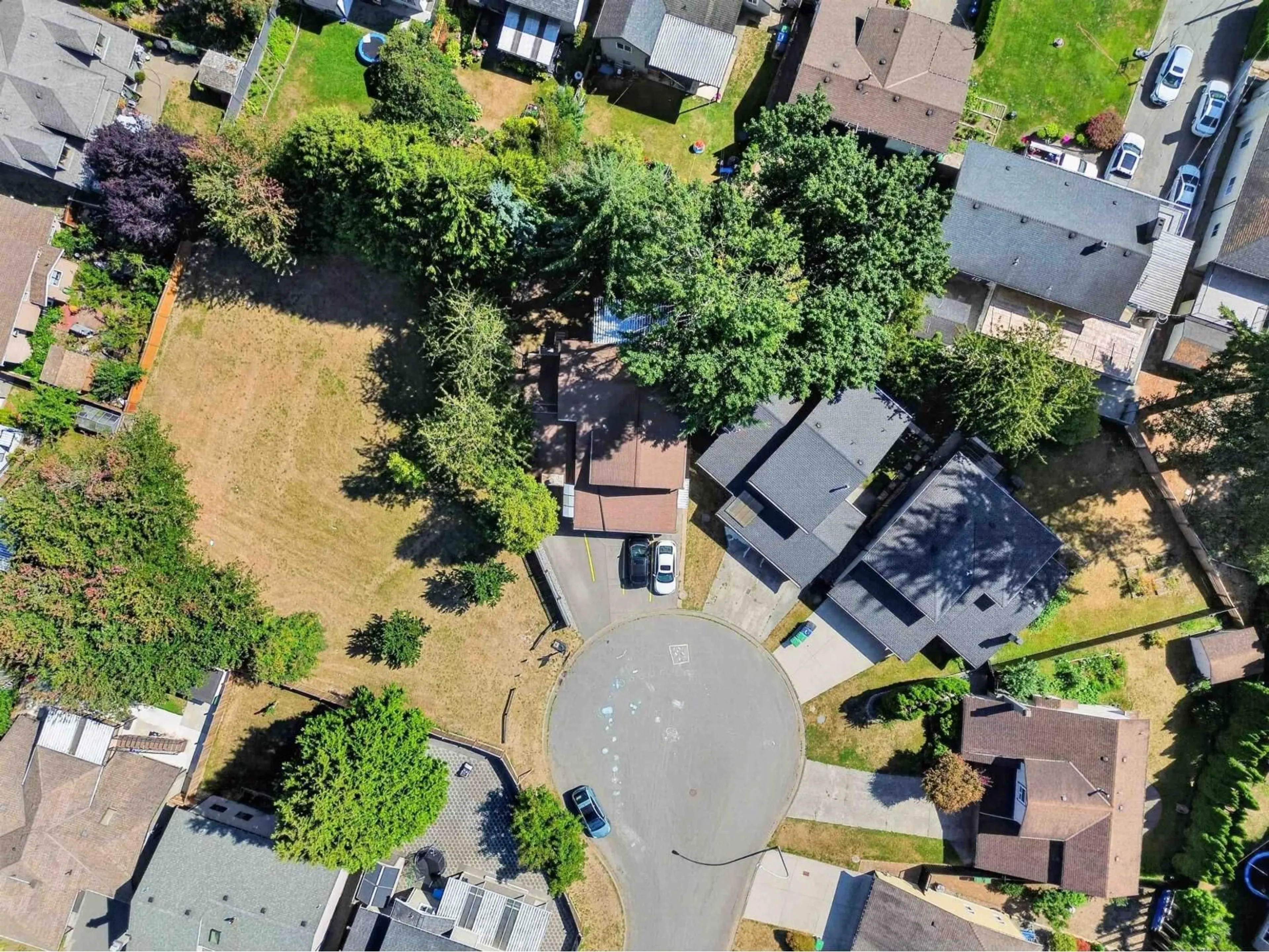 A pic from outside/outdoor area/front of a property/back of a property/a pic from drone, street for 13355 65A AVENUE, Surrey British Columbia V3W8T2
