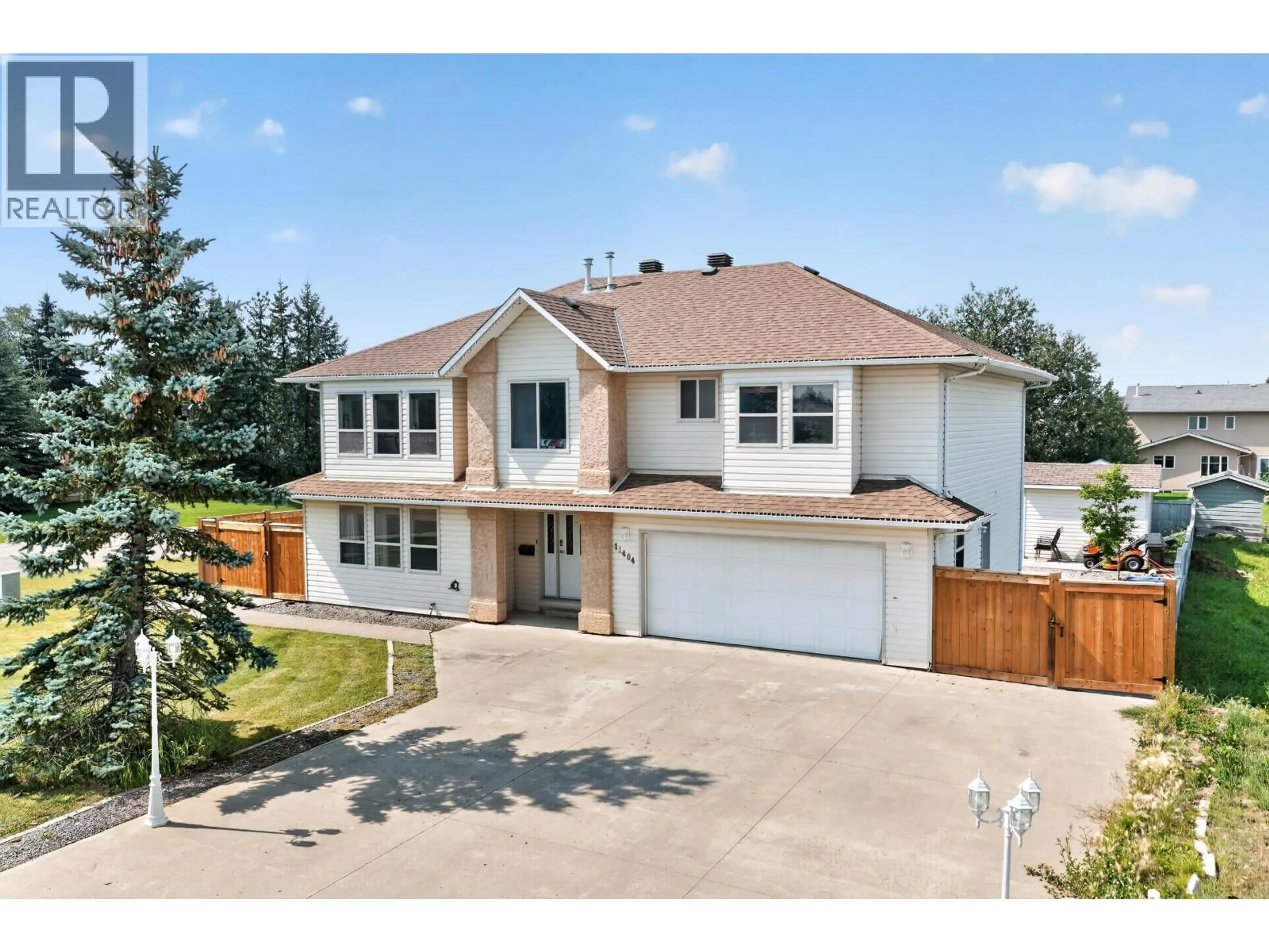 A pic from outside/outdoor area/front of a property/back of a property/a pic from drone, street for 11404 108 STREET, Fort St. John British Columbia V1J6Y2
