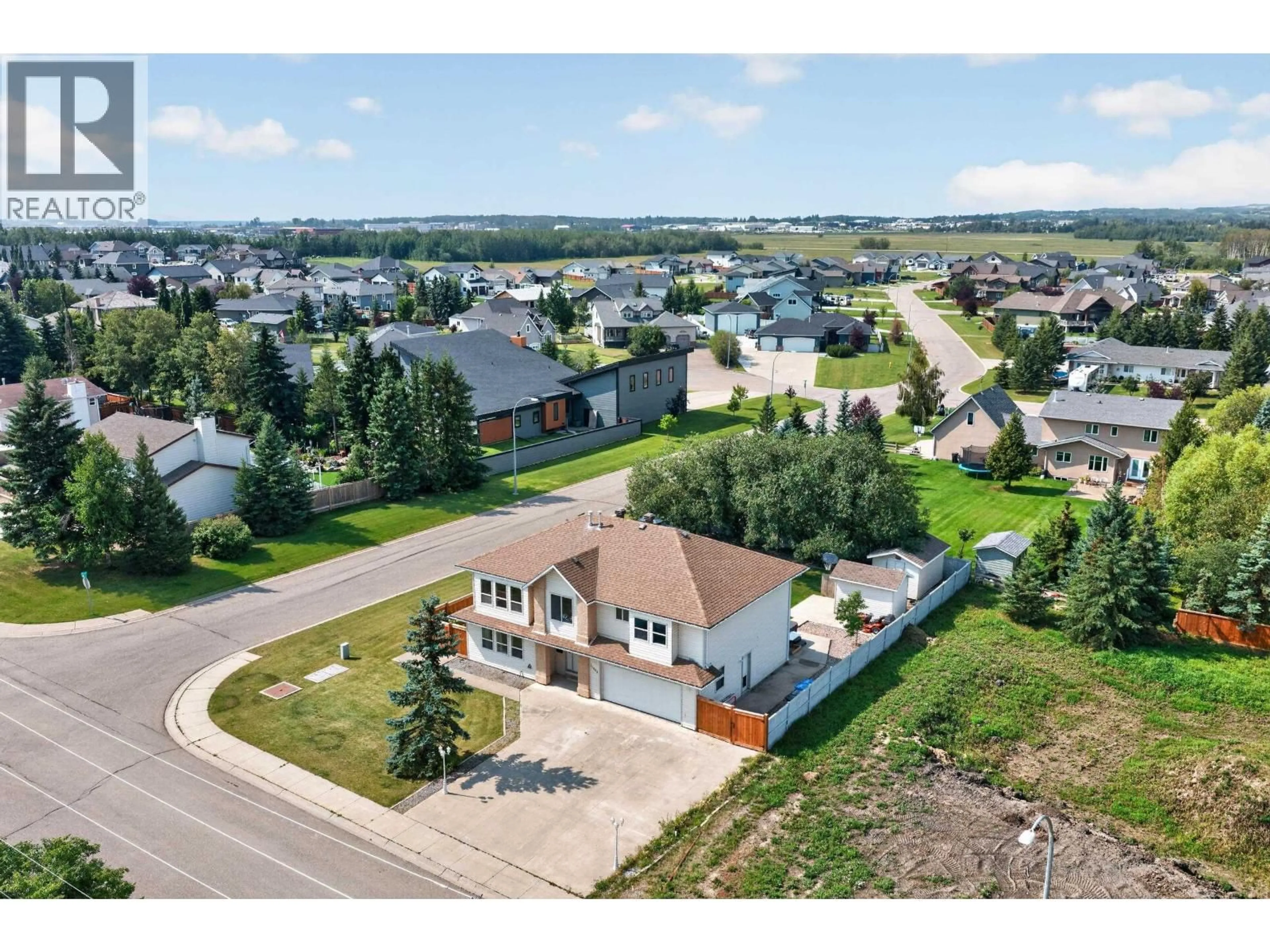 A pic from outside/outdoor area/front of a property/back of a property/a pic from drone, street for 11404 108 STREET, Fort St. John British Columbia V1J6Y2