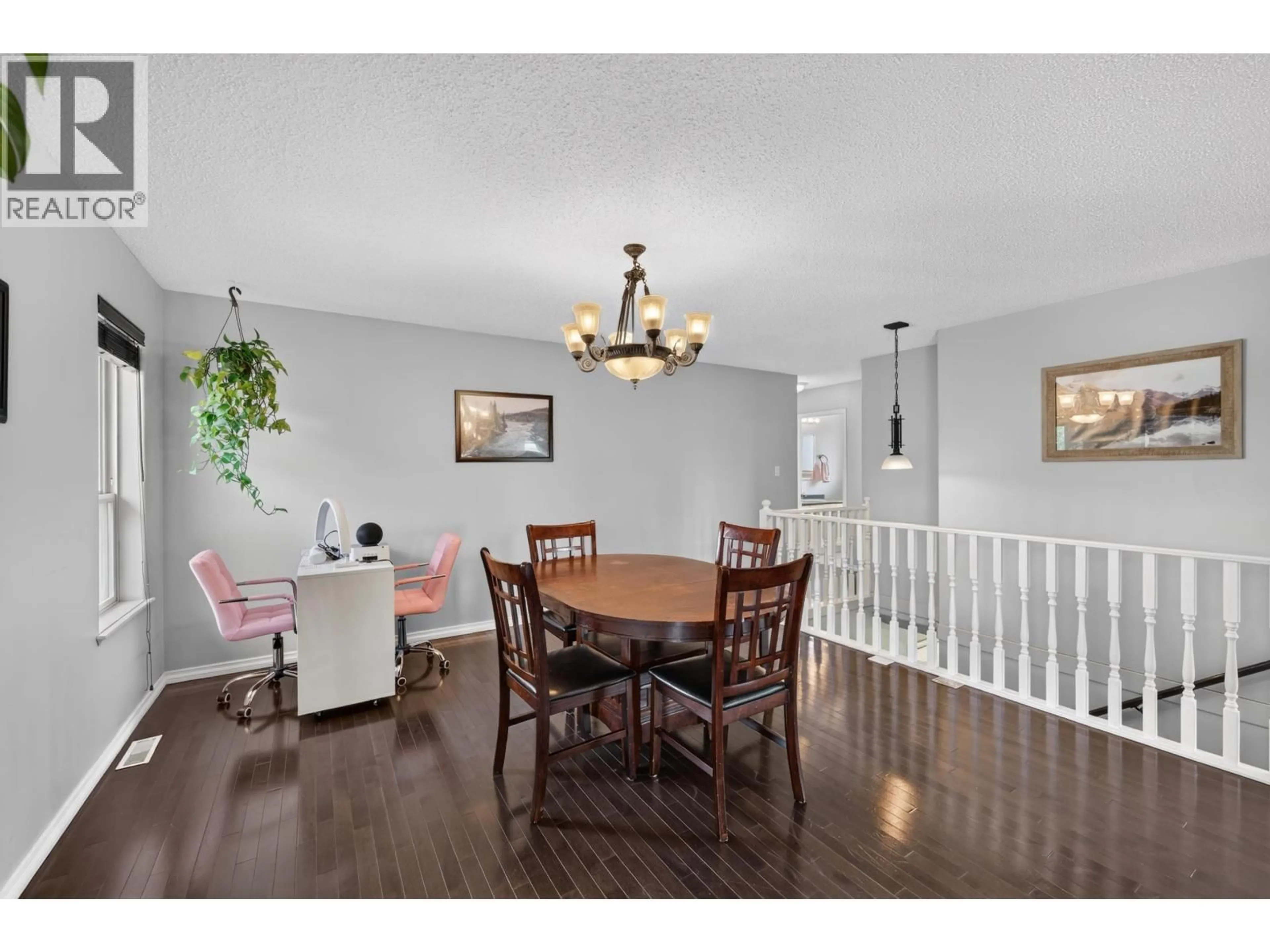 Dining room, wood/laminate floor for 11404 108 STREET, Fort St. John British Columbia V1J6Y2