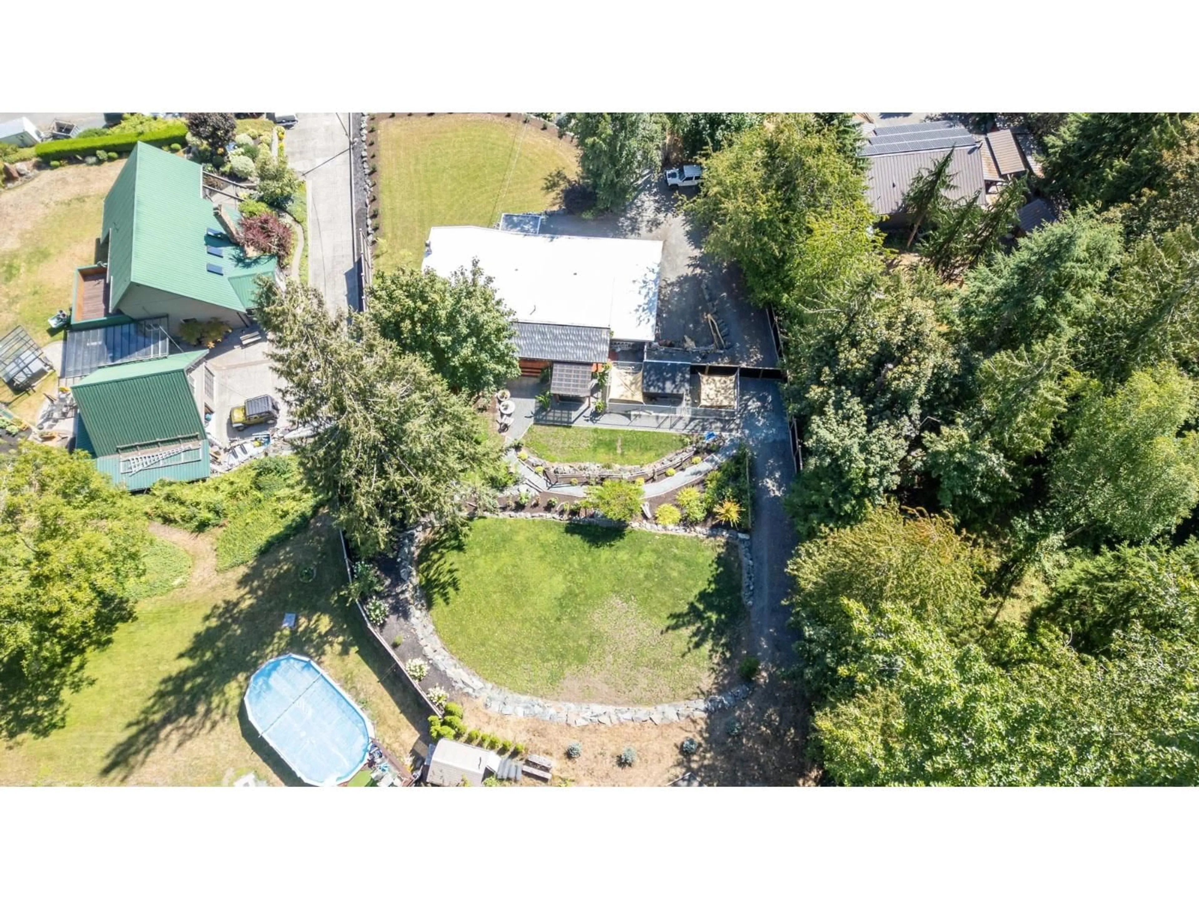 A pic from outside/outdoor area/front of a property/back of a property/a pic from drone, unknown for 47913 HANSOM ROAD, Chilliwack British Columbia V2R4R9