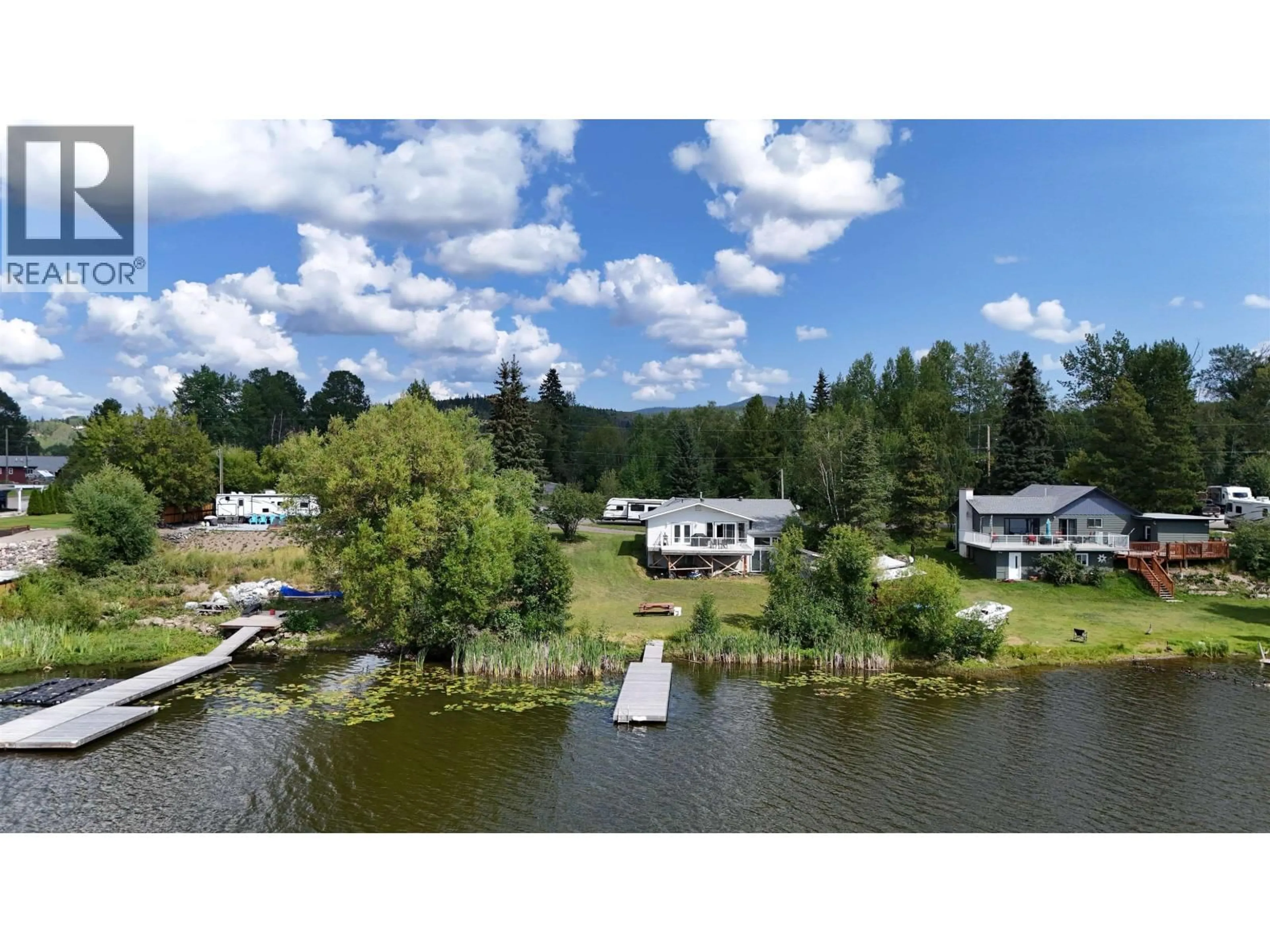 A pic from outside/outdoor area/front of a property/back of a property/a pic from drone, water/lake/river/ocean view for 2055 GEROW ISLAND ROAD, Burns Lake British Columbia V0J1E2