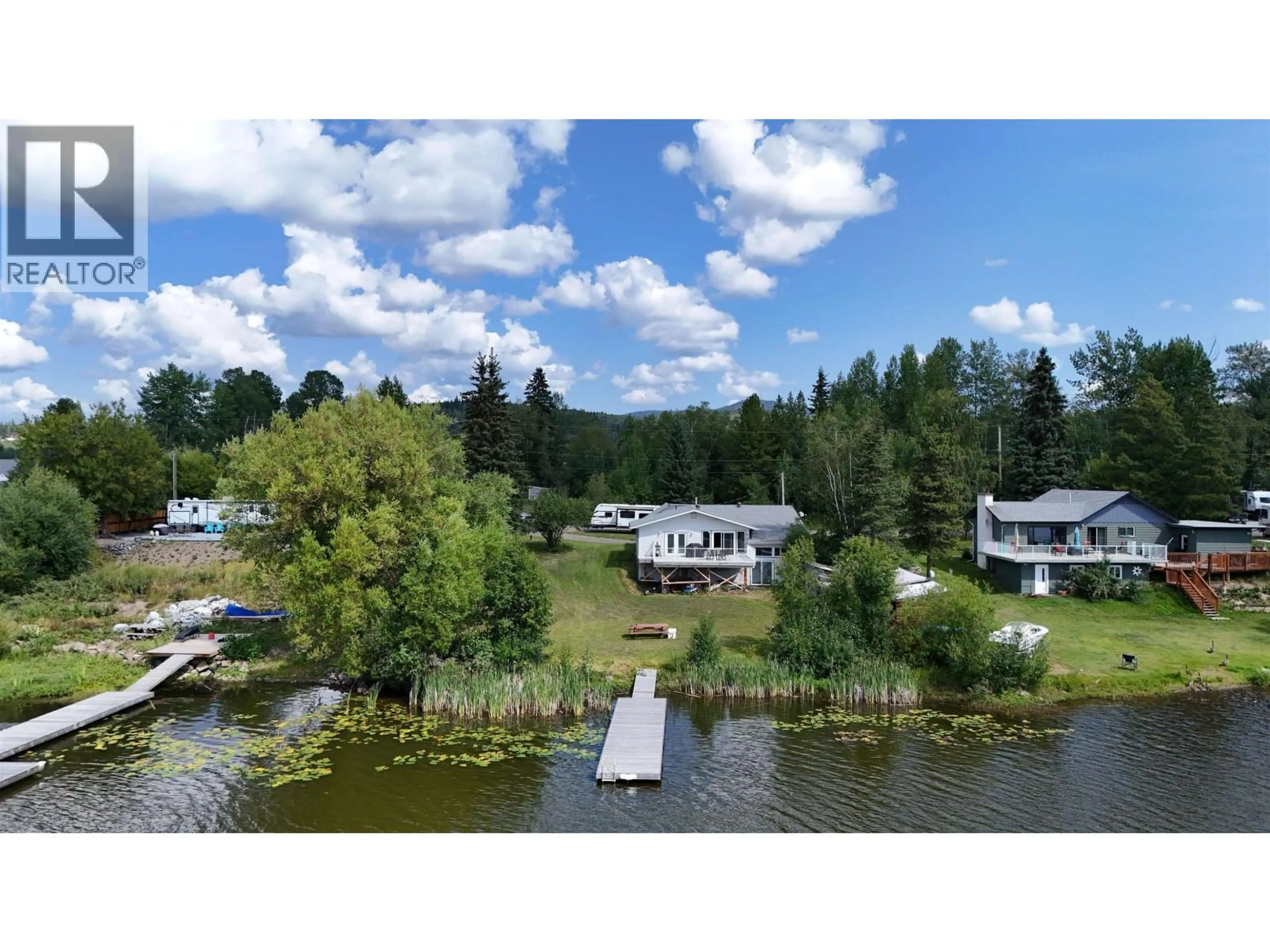 A pic from outside/outdoor area/front of a property/back of a property/a pic from drone, water/lake/river/ocean view for 2055 GEROW ISLAND ROAD, Burns Lake British Columbia V0J1E2