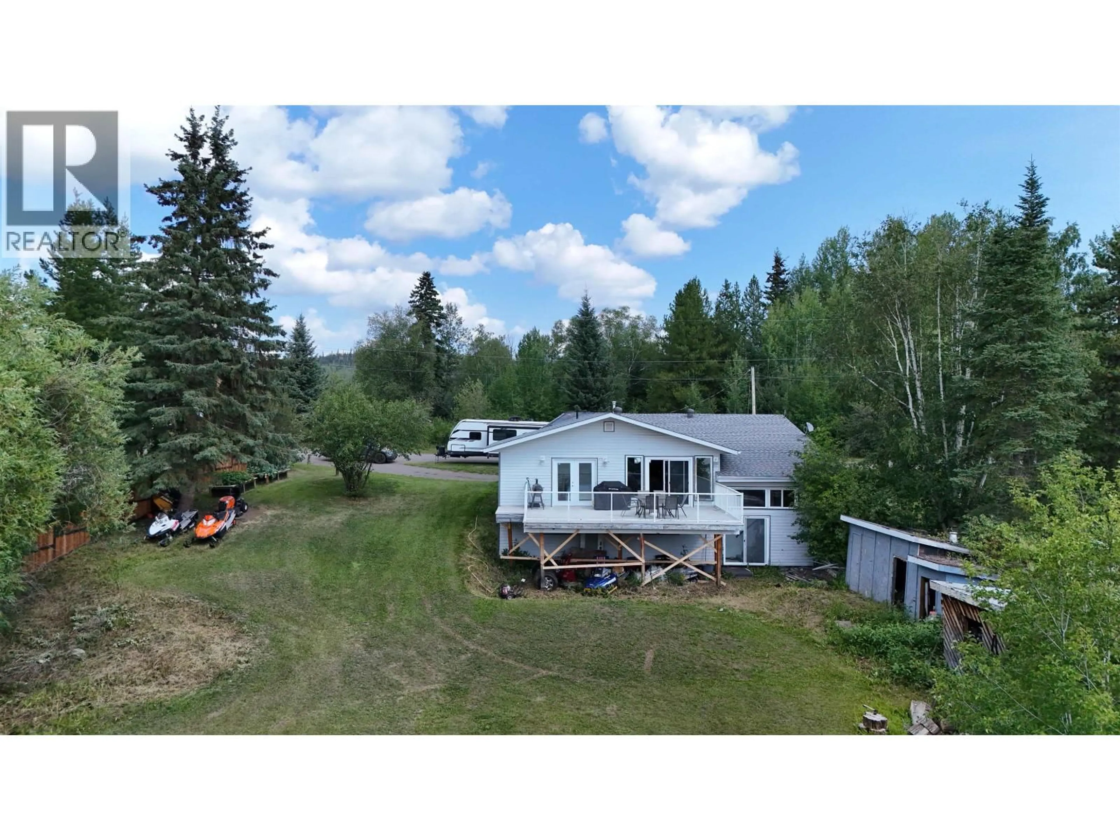 A pic from outside/outdoor area/front of a property/back of a property/a pic from drone, forest/trees view for 2055 GEROW ISLAND ROAD, Burns Lake British Columbia V0J1E2