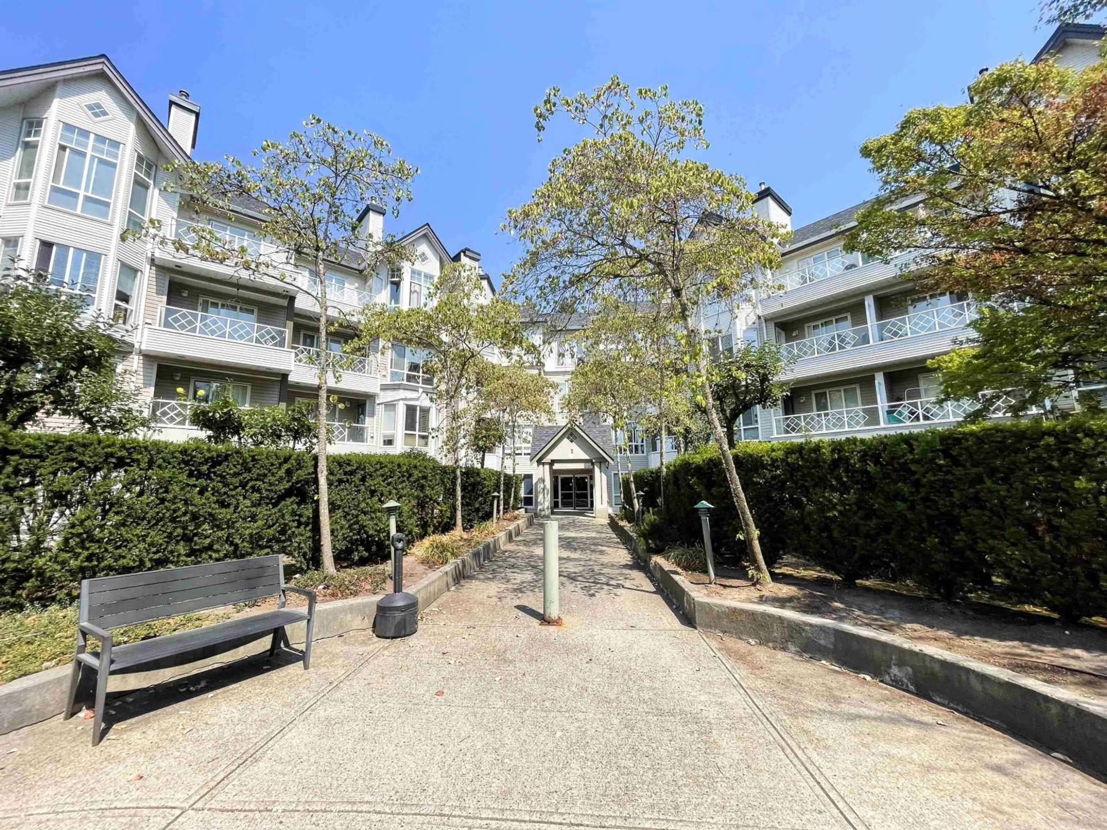 A pic from outside/outdoor area/front of a property/back of a property/a pic from drone, street for 102 - 9979 140 STREET, Surrey British Columbia V3T5W2