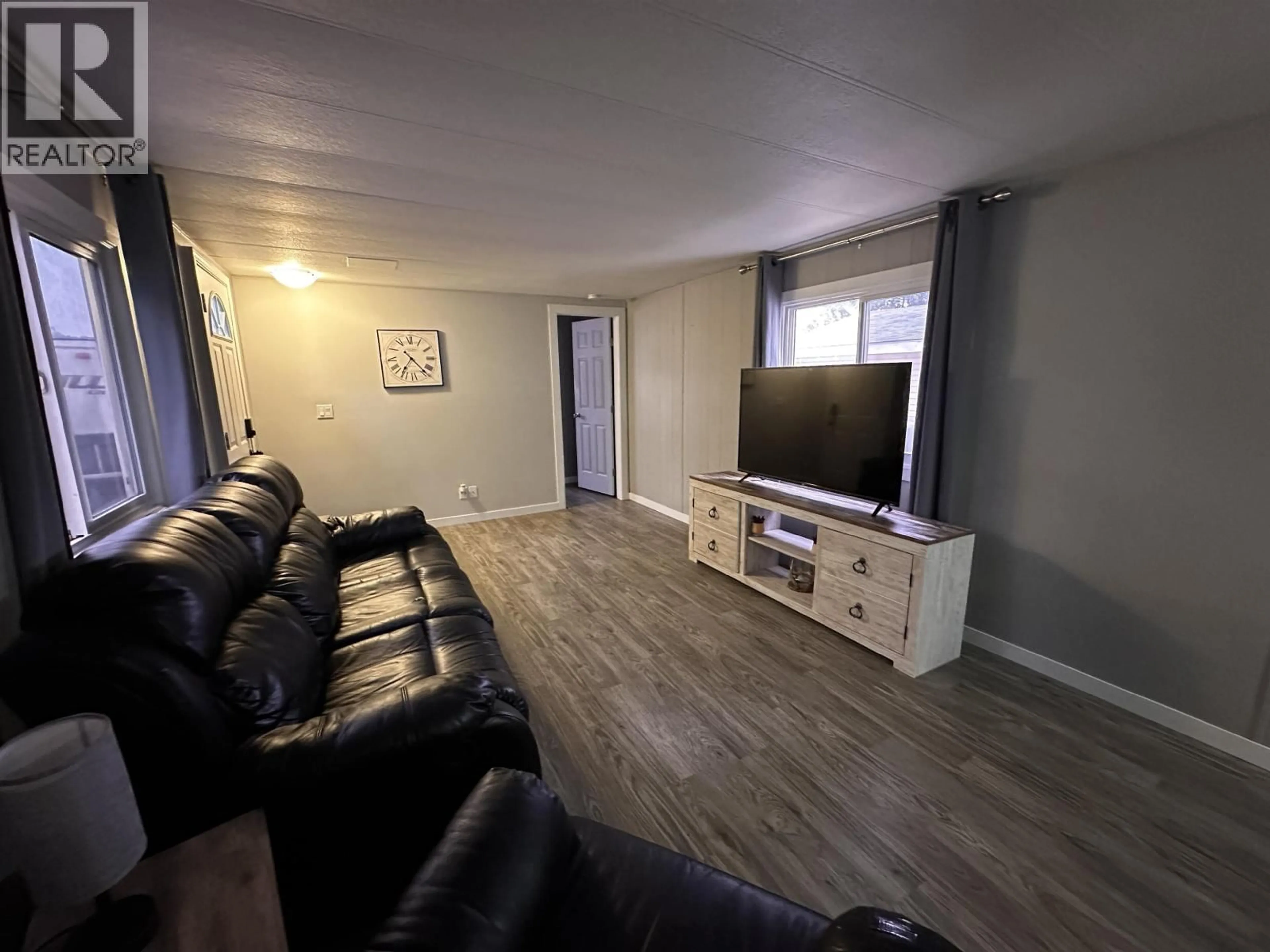 Living room with furniture, unknown for 4107 53 AVENUE, Fort Nelson British Columbia V0C1R0