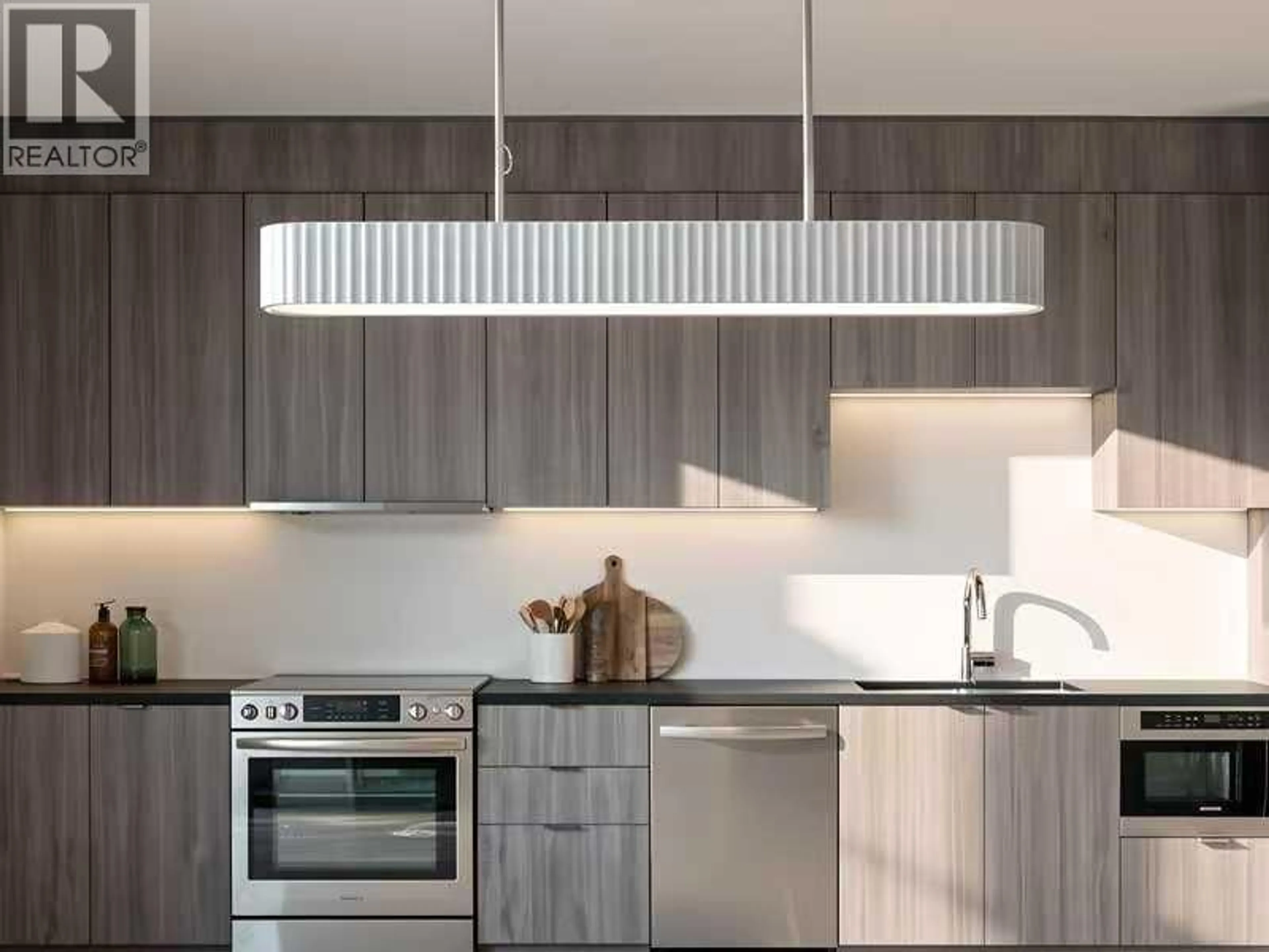 Contemporary kitchen, wood/laminate floor for 303 - 5490 ASH STREET, Vancouver British Columbia V5Z3G6