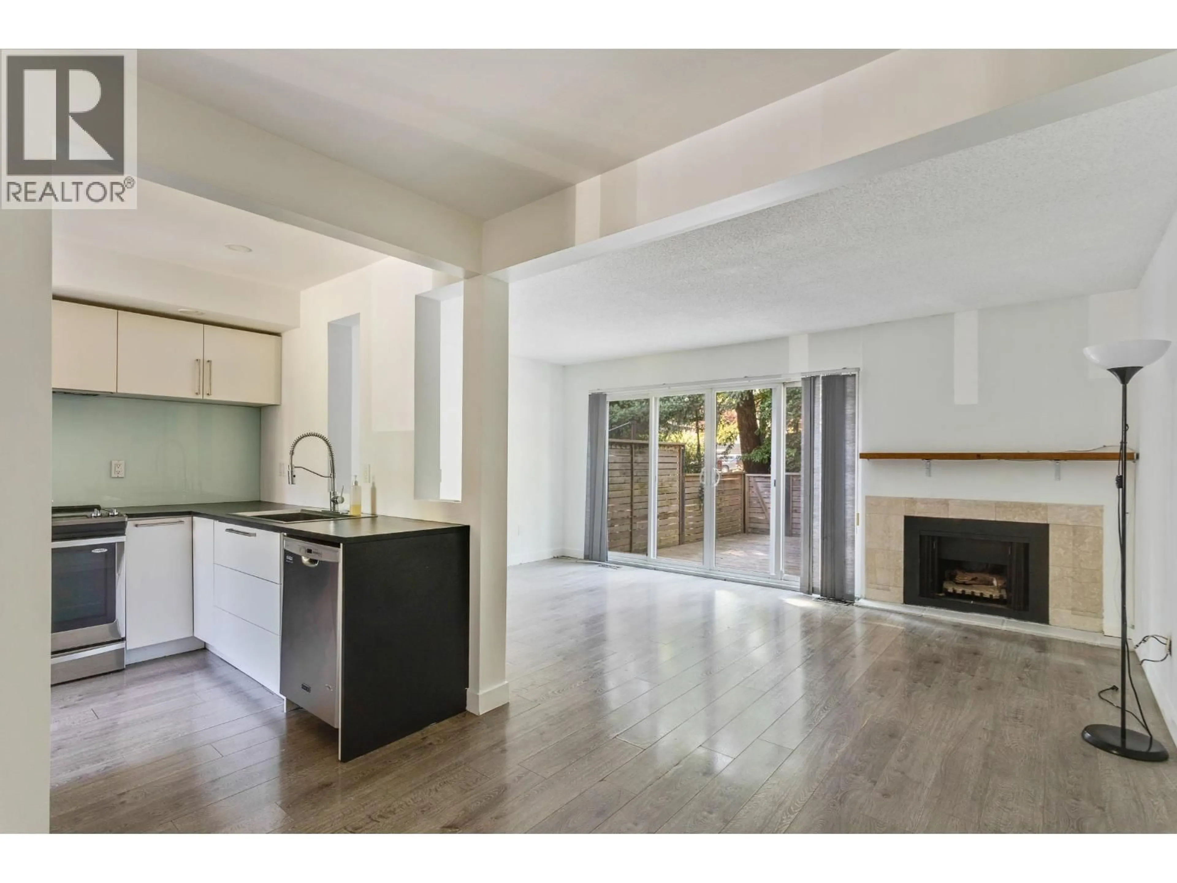 Open concept kitchen, unknown for 65 - 1930 CEDAR VILLAGE CRESCENT, North Vancouver British Columbia V7J3M5