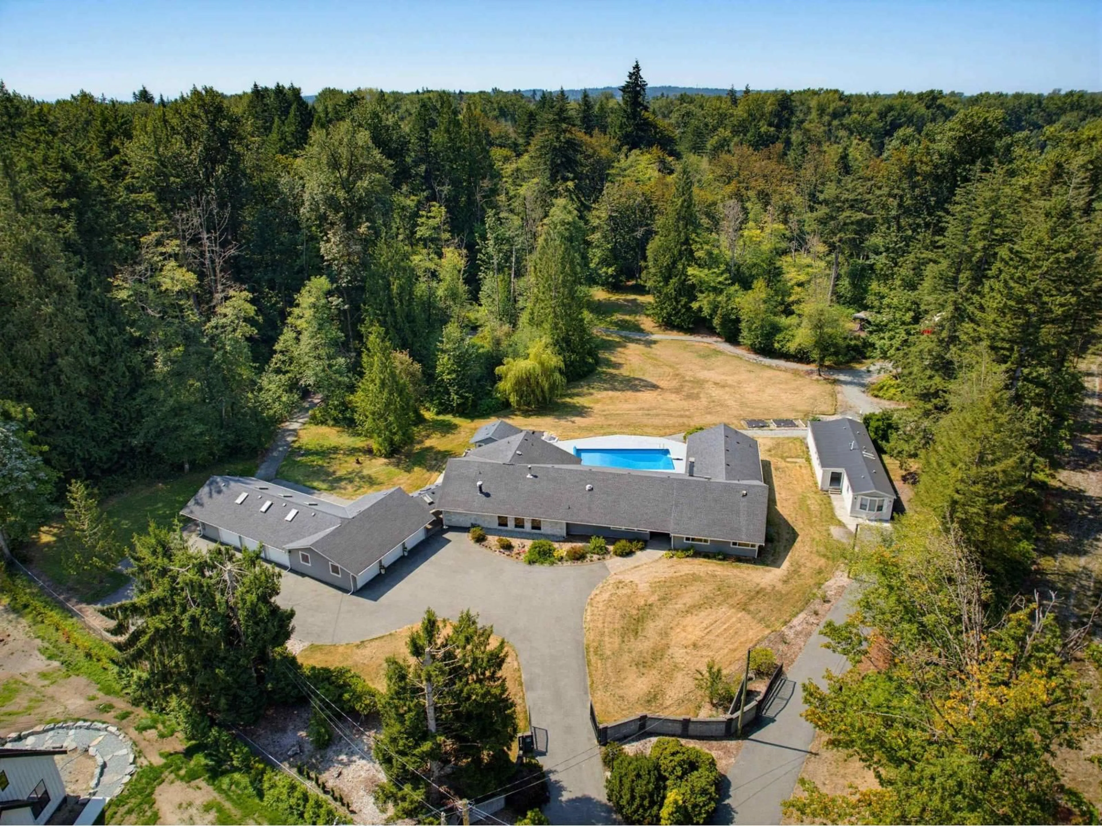 A pic from outside/outdoor area/front of a property/back of a property/a pic from drone, forest/trees view for 1233 231 STREET, Langley British Columbia V2Z2X1