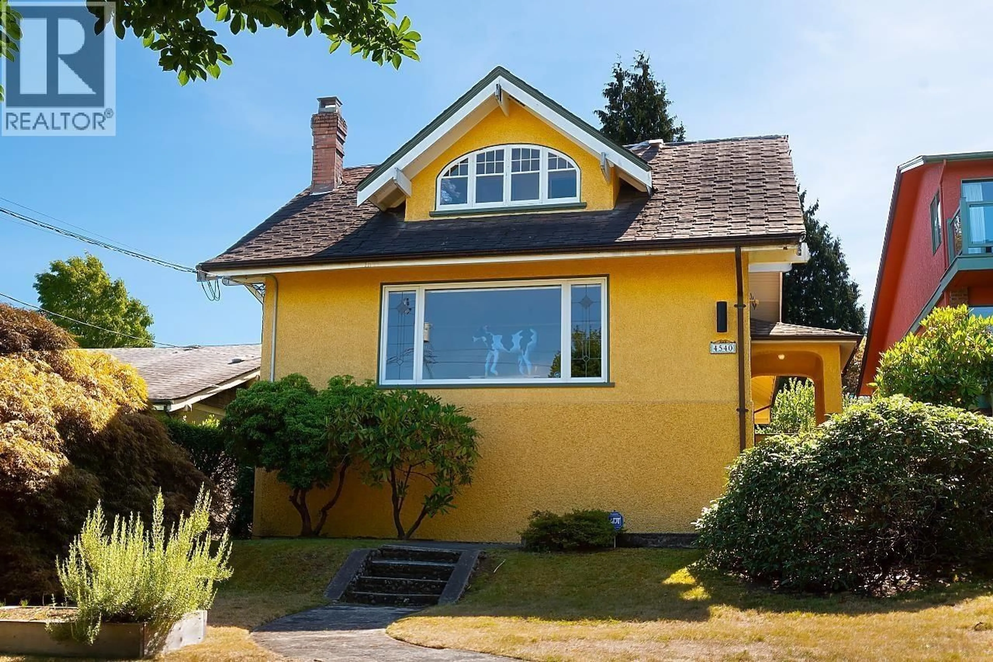 Home with vinyl exterior material, street for 4540 3RD AVENUE, Vancouver British Columbia V6R1N2
