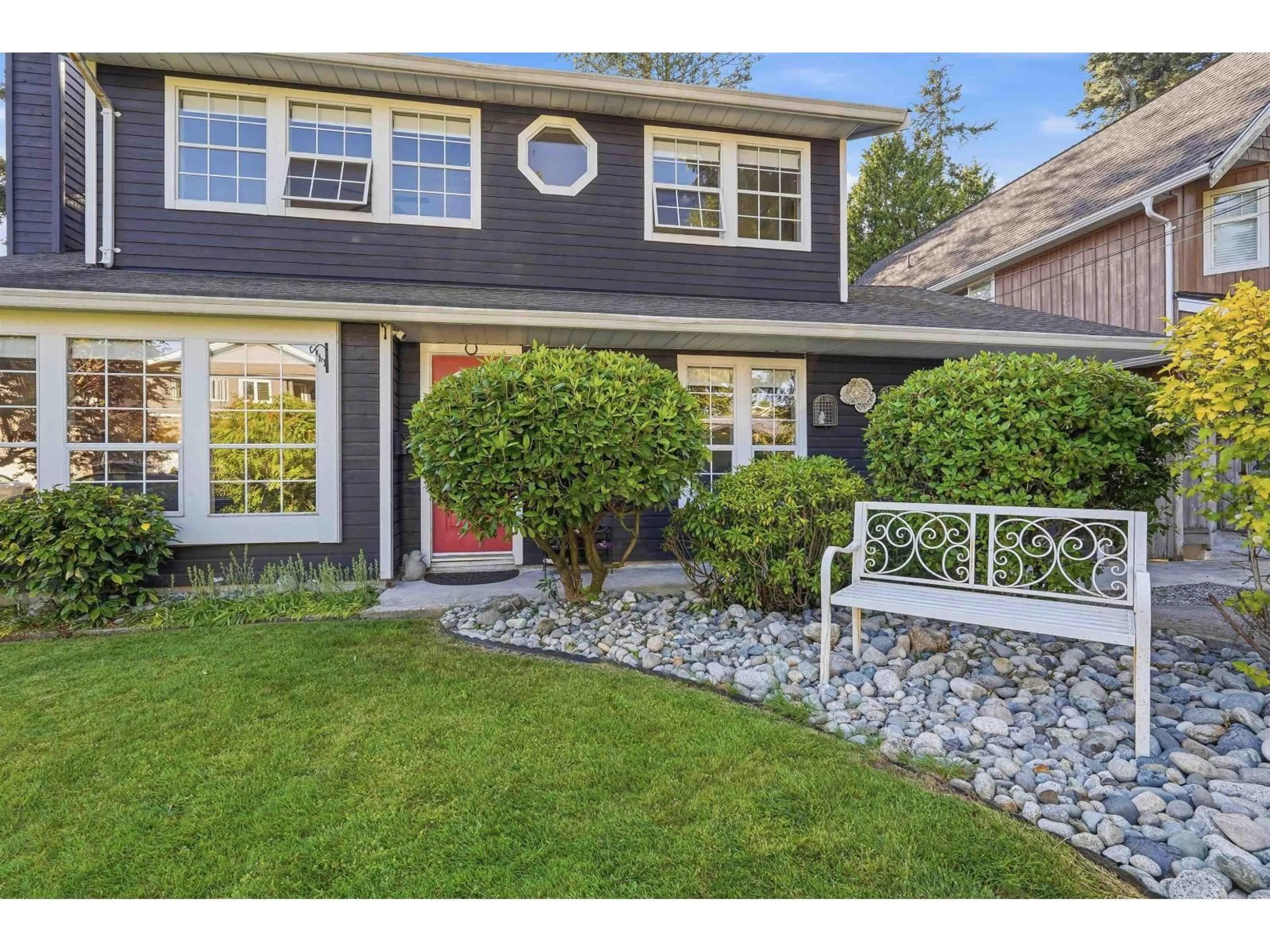 Home with vinyl exterior material, street for 1425 129 STREET, Surrey British Columbia V4A3X9