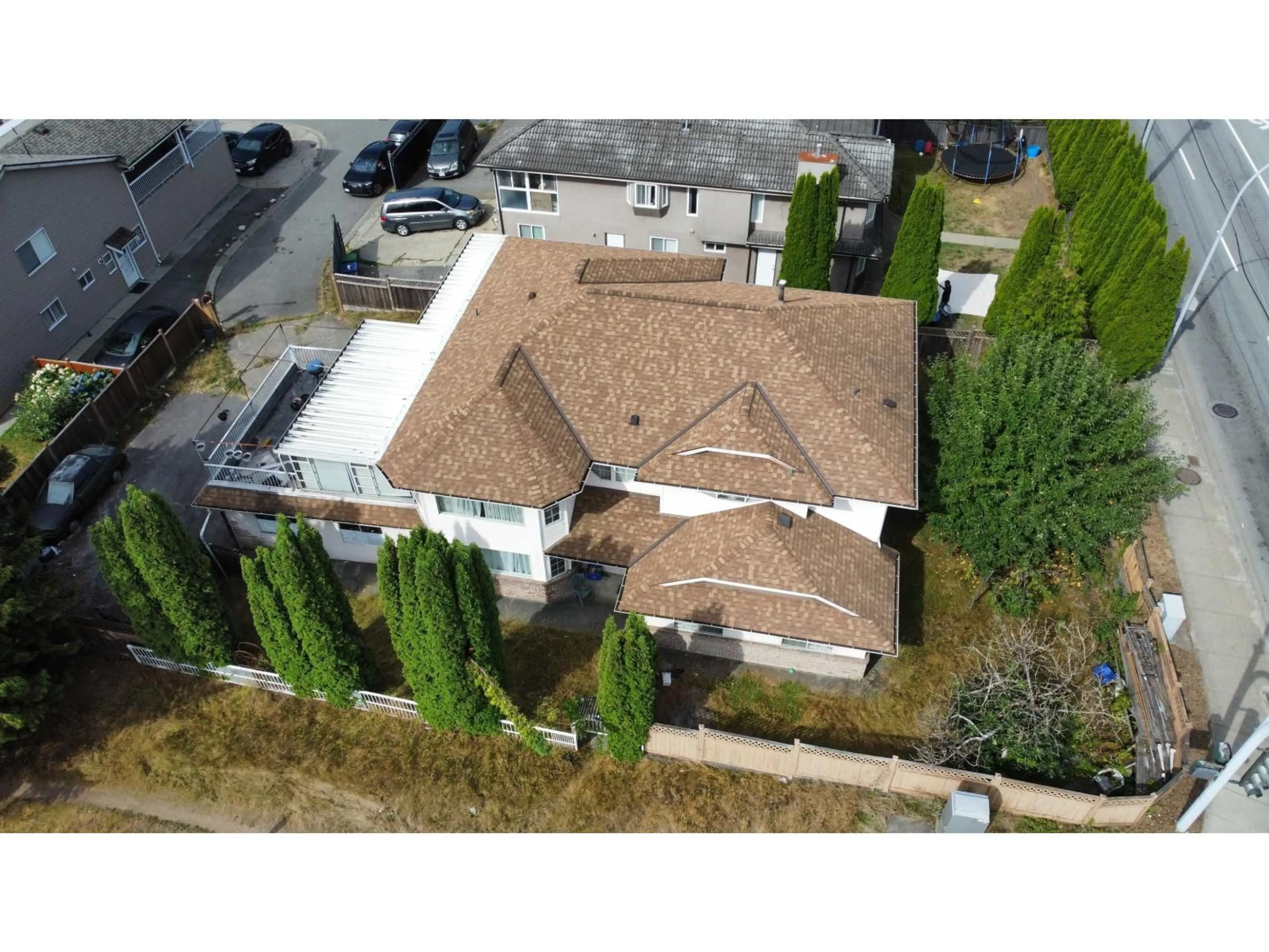A pic from outside/outdoor area/front of a property/back of a property/a pic from drone, street for 8789 144 STREET, Surrey British Columbia V3S2S5