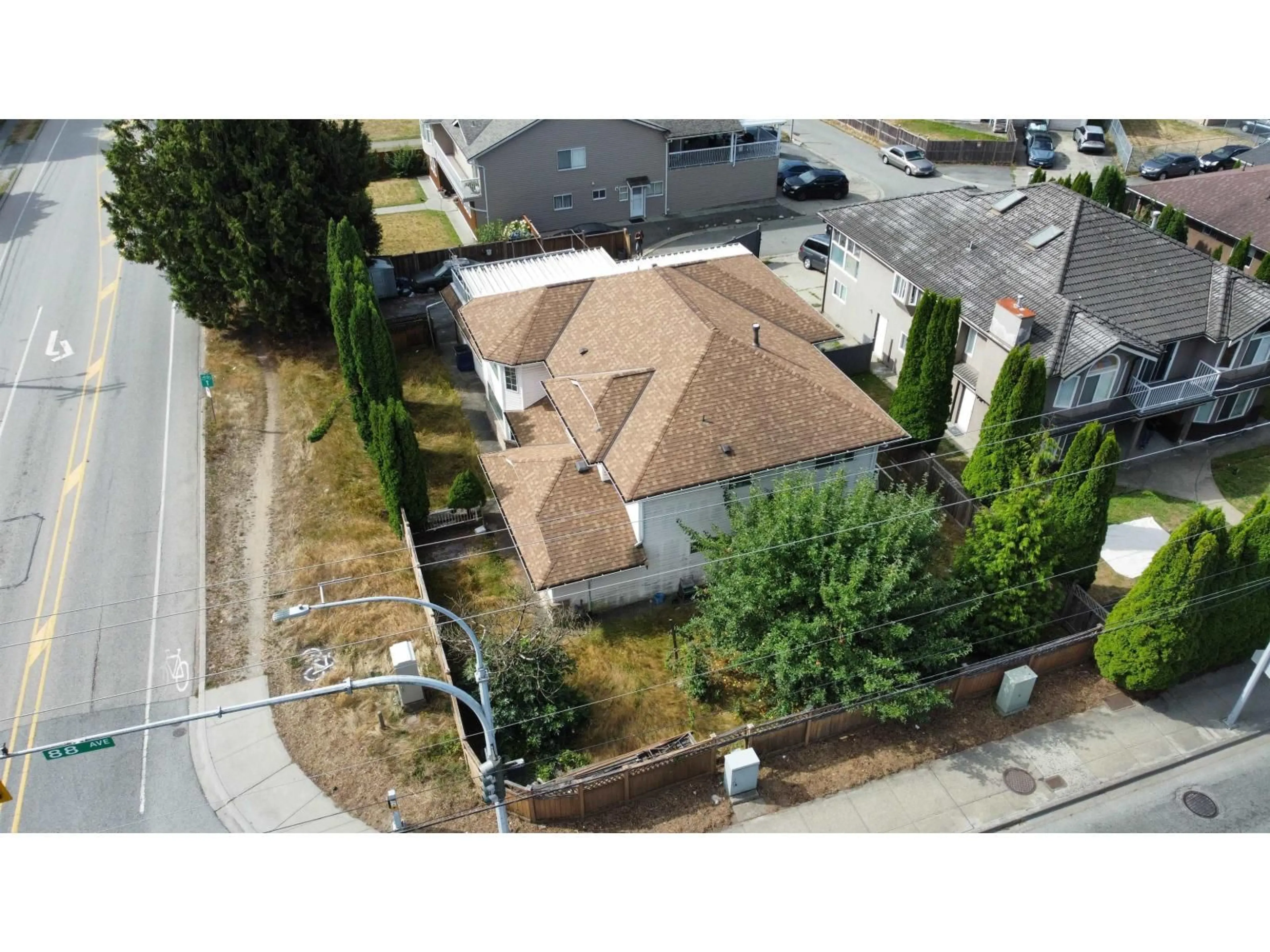 A pic from outside/outdoor area/front of a property/back of a property/a pic from drone, street for 8789 144 STREET, Surrey British Columbia V3S2S5