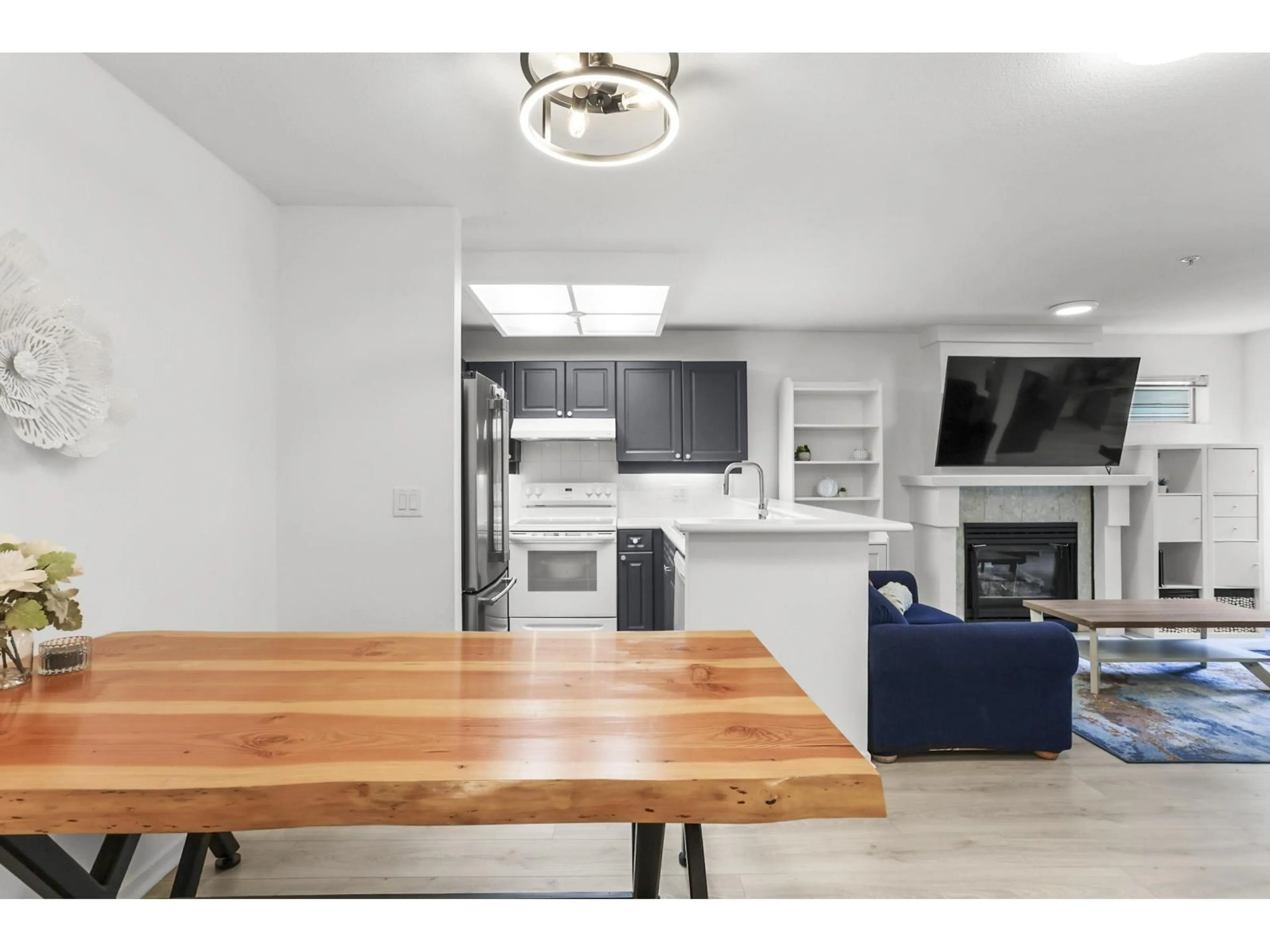 Open concept kitchen, unknown for 221 - 22015 48 AVENUE, Langley British Columbia V3A8L3