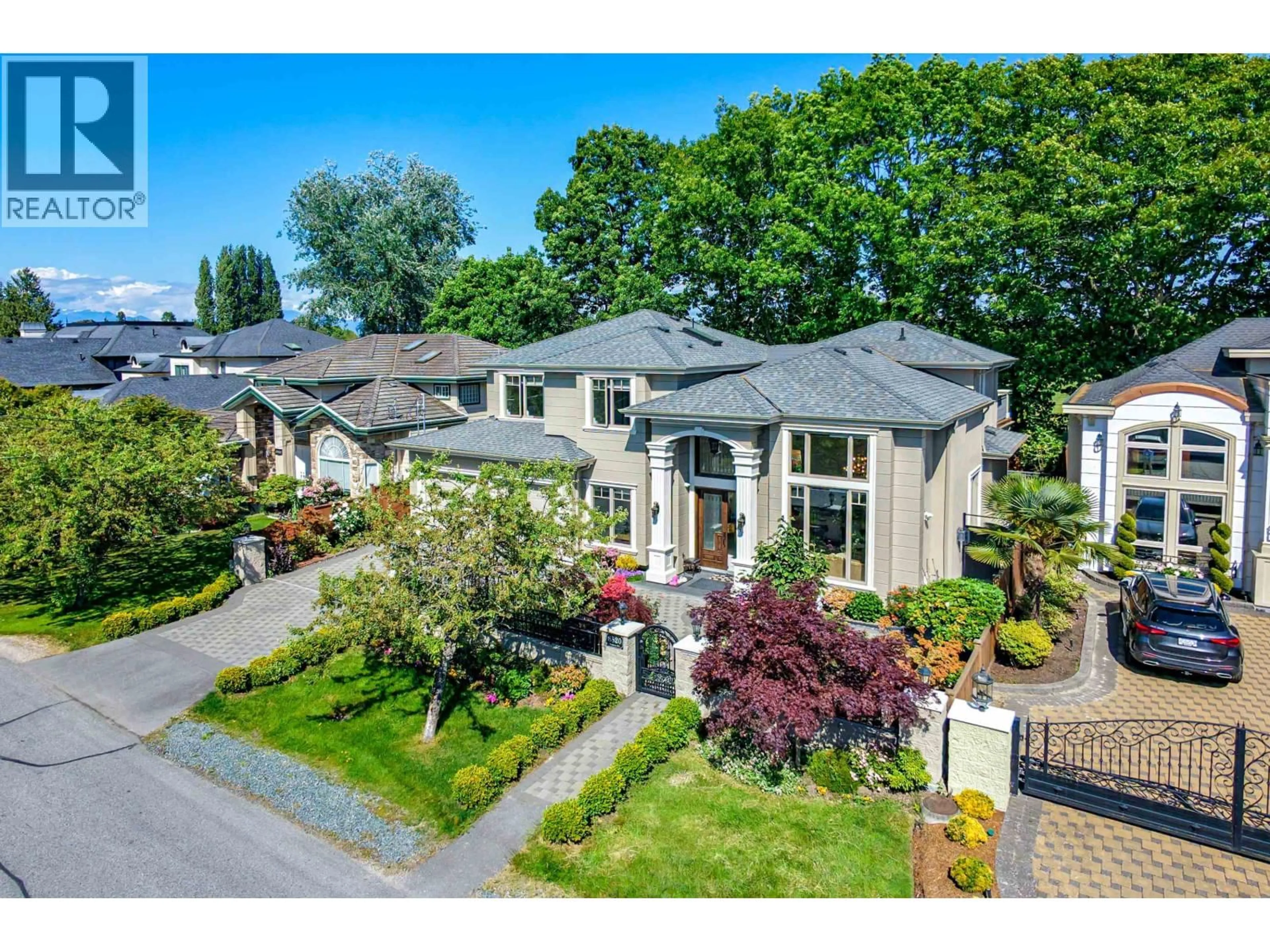 A pic from outside/outdoor area/front of a property/back of a property/a pic from drone, street for 8520 ELSMORE ROAD, Richmond British Columbia V7C2A1